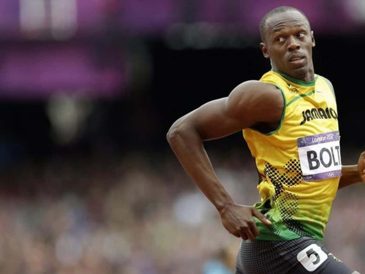 Usain Bolt løb seende tilbage som tapet. Wallpaper