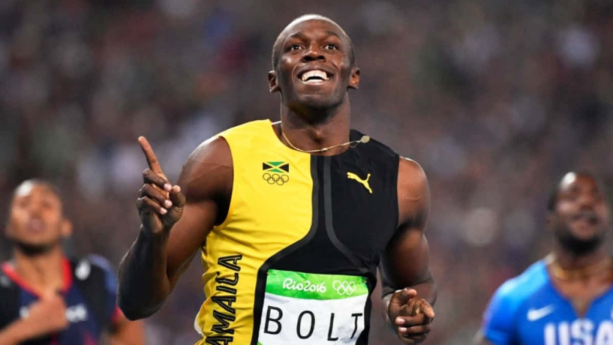 Usain Bolt, smilende og peger op, tapet Wallpaper