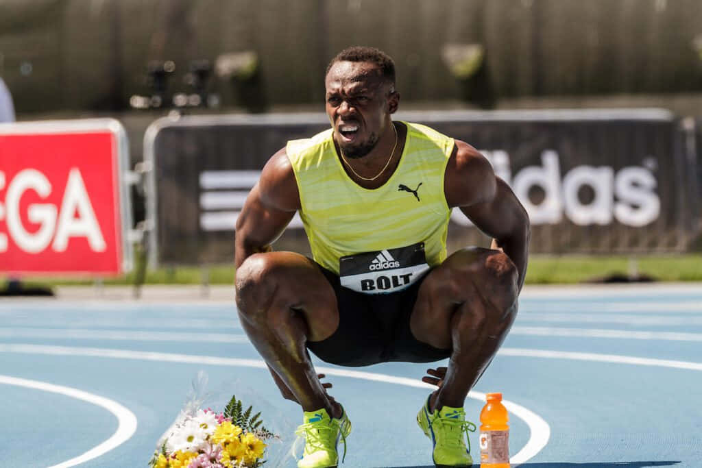 Usain Bolt strækker klar til at løbe tapet Wallpaper