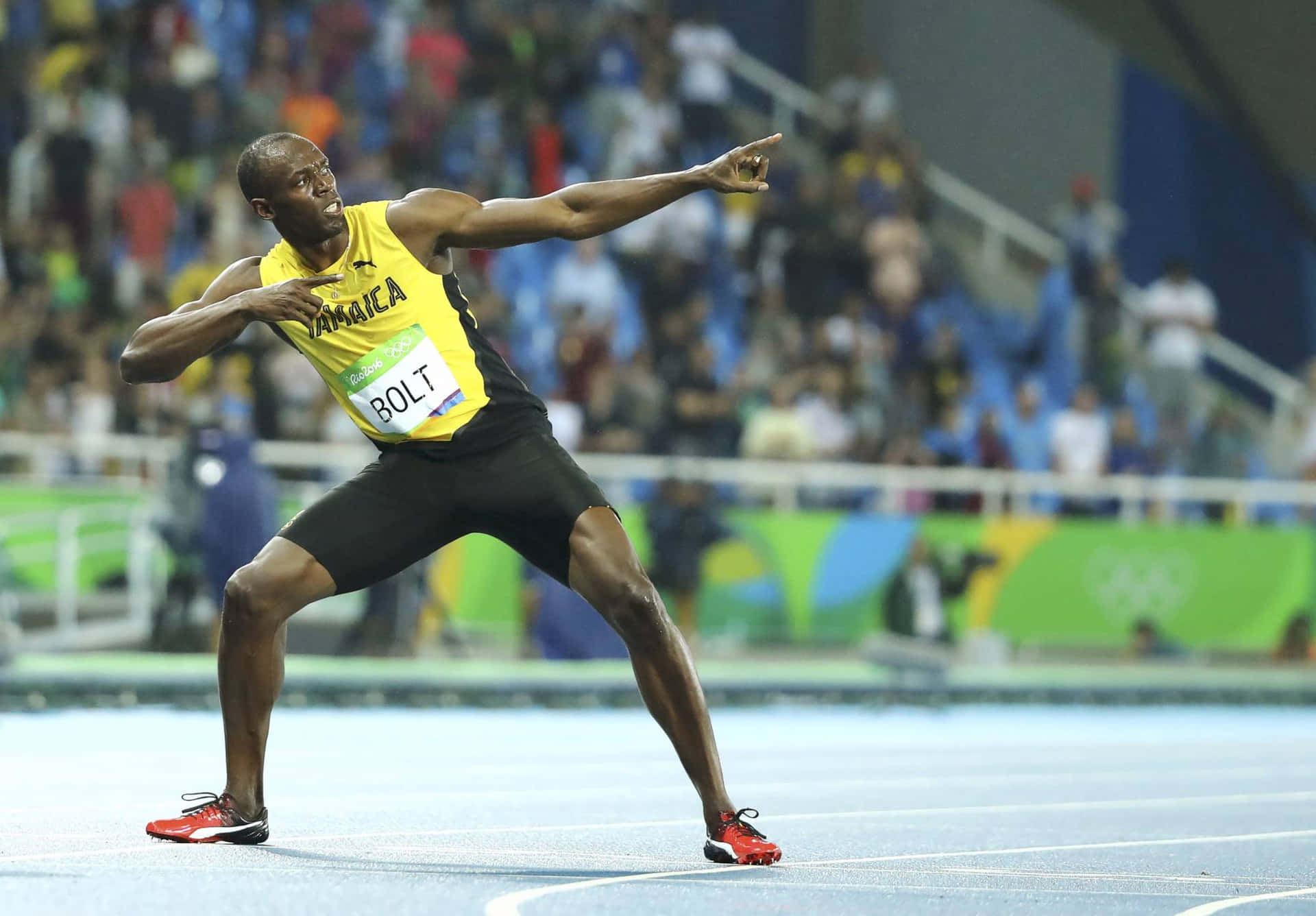 Usain Bolt Strikes Iconic Pose Wallpaper