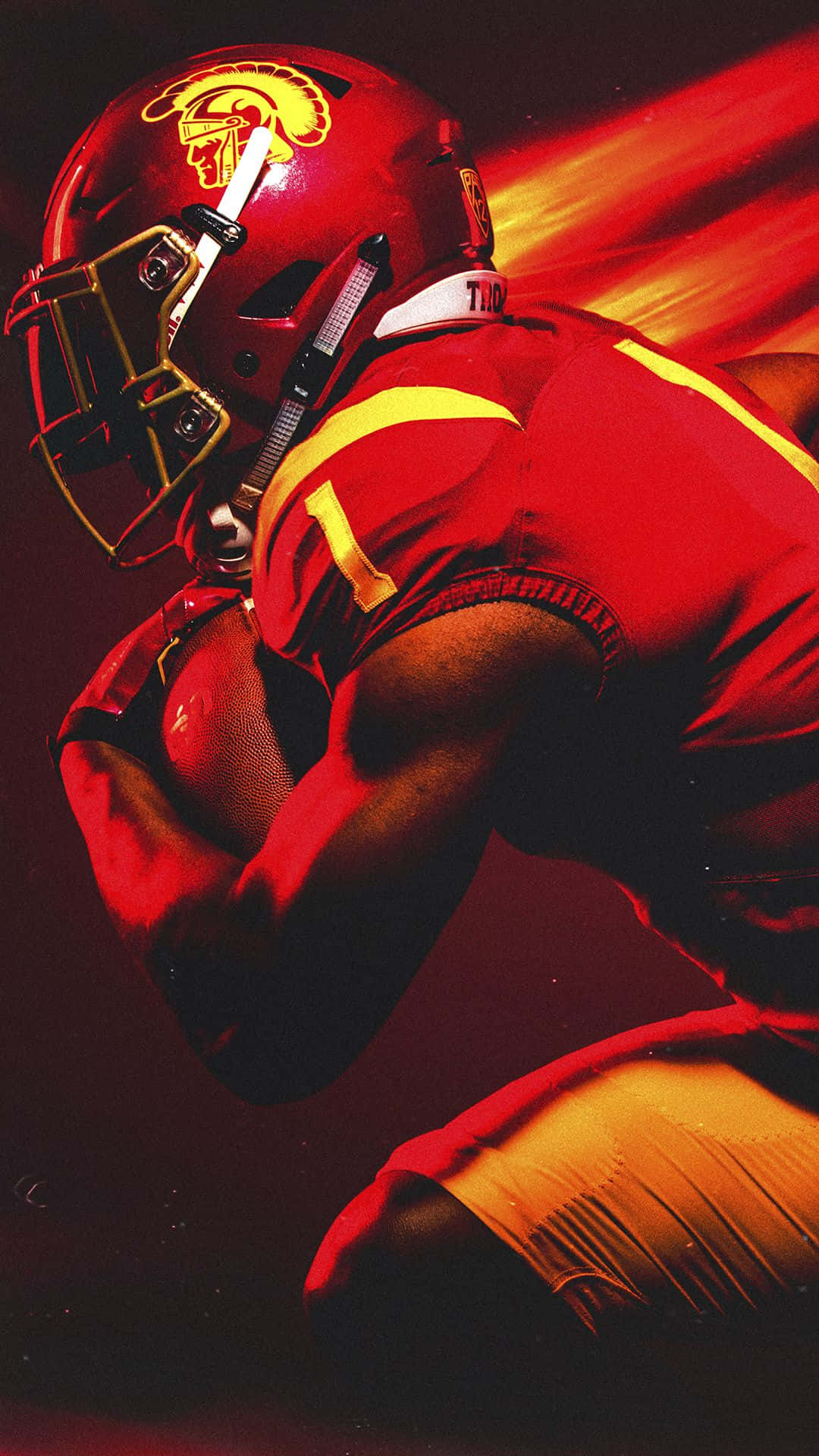 En USC fodboldspiller iført rød og gul uniform. Wallpaper