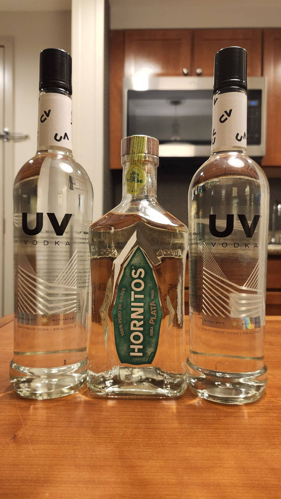 Uvvodka Y Hornitos Tequila Reposado. Fondo de pantalla