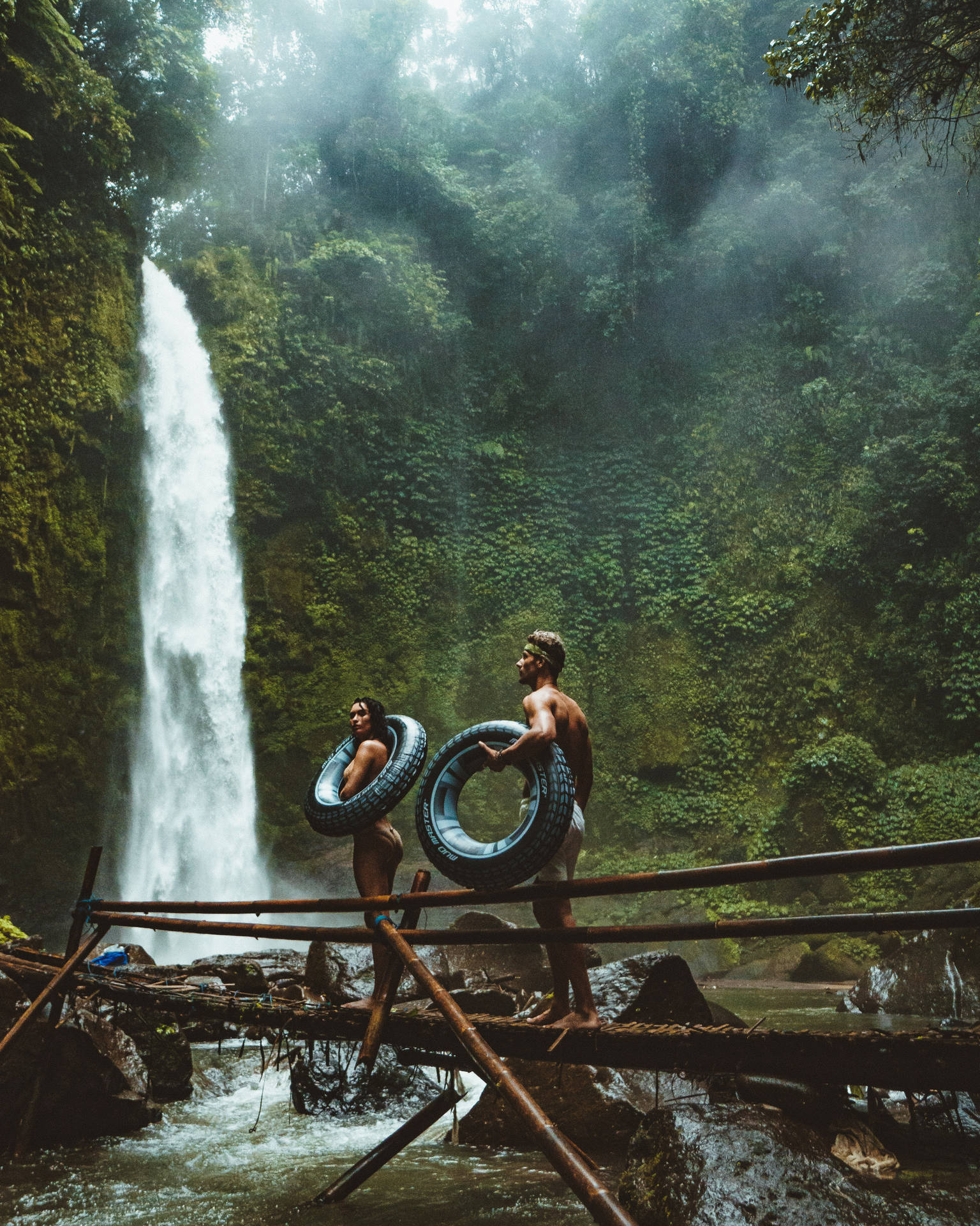 Vacation Couple At Waterfall Wallpaper