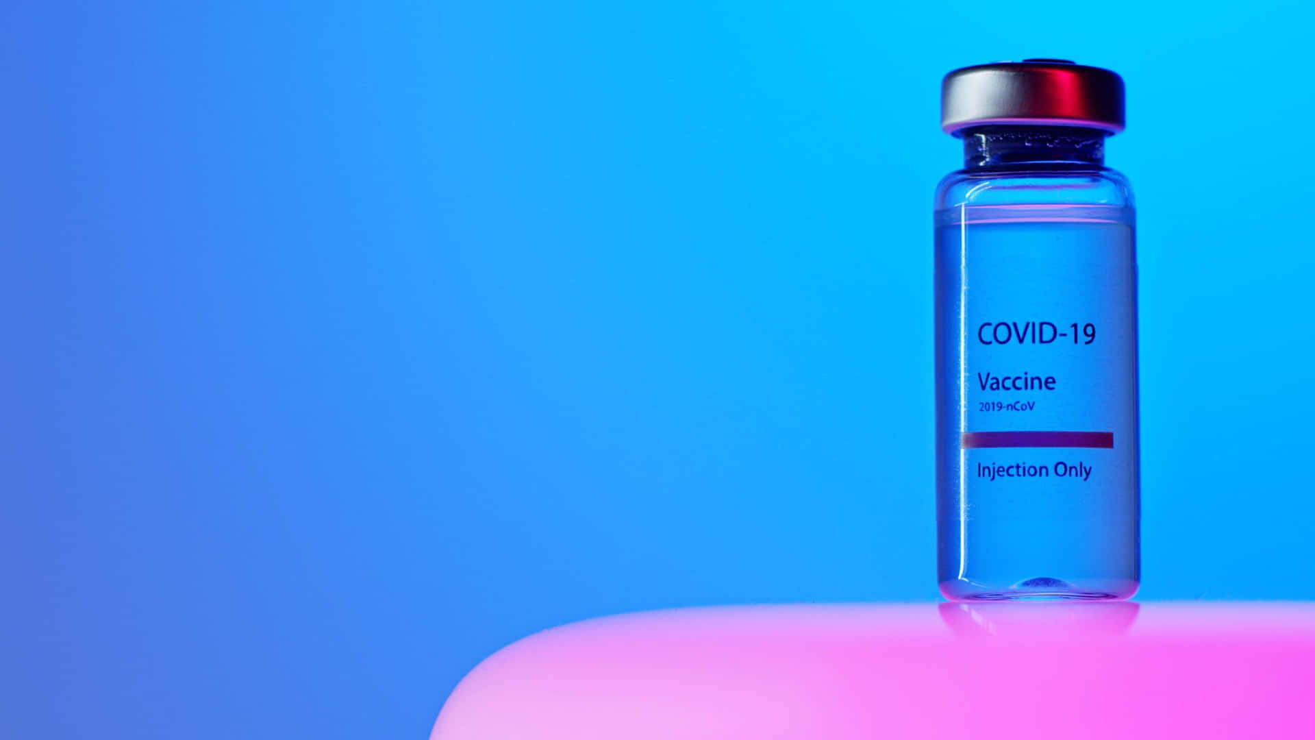 Imagende Una Botella De Vacuna Azul Transparente.
