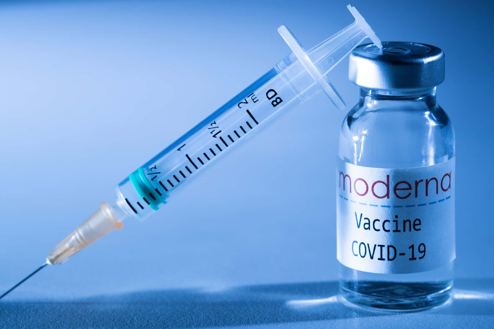 Ripresaravvicinata Di Fiala Di Vaccino E Siringa