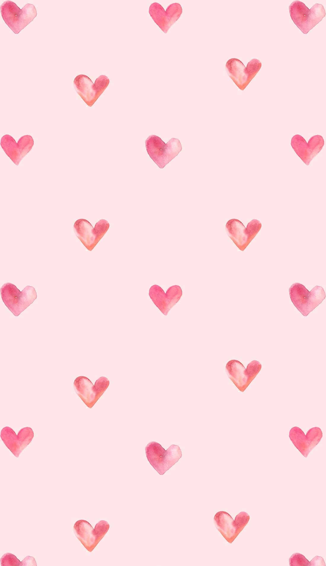 Pink Hearts On A Pink Background Wallpaper