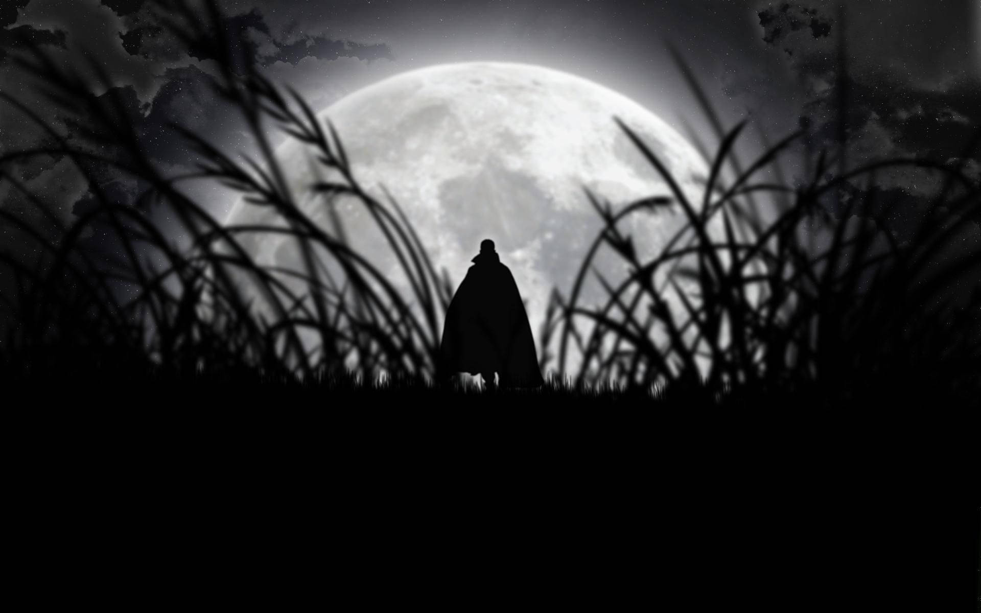 A Vampire Silhouette under a Full Moon Wallpaper