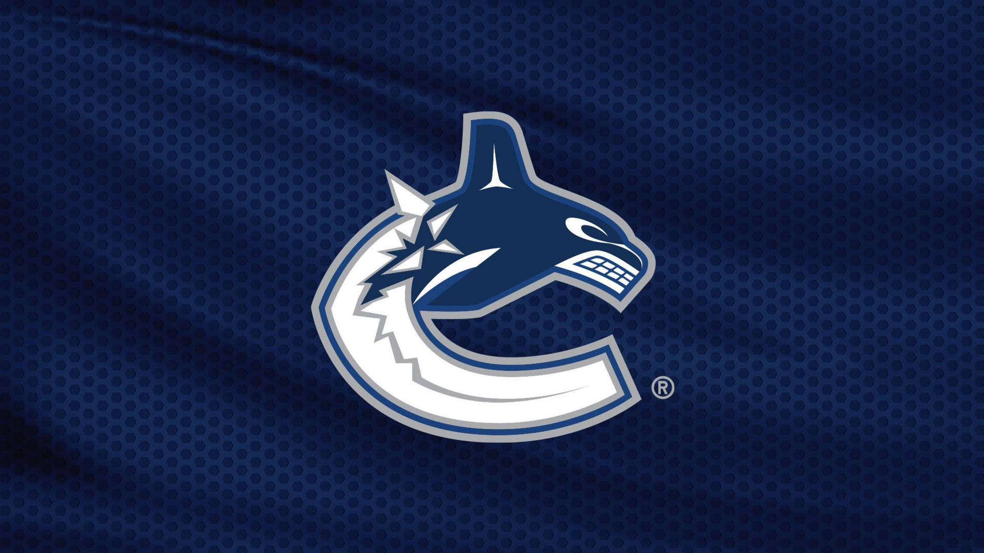 Vancouver Canucks Logo On Blue Wallpaper