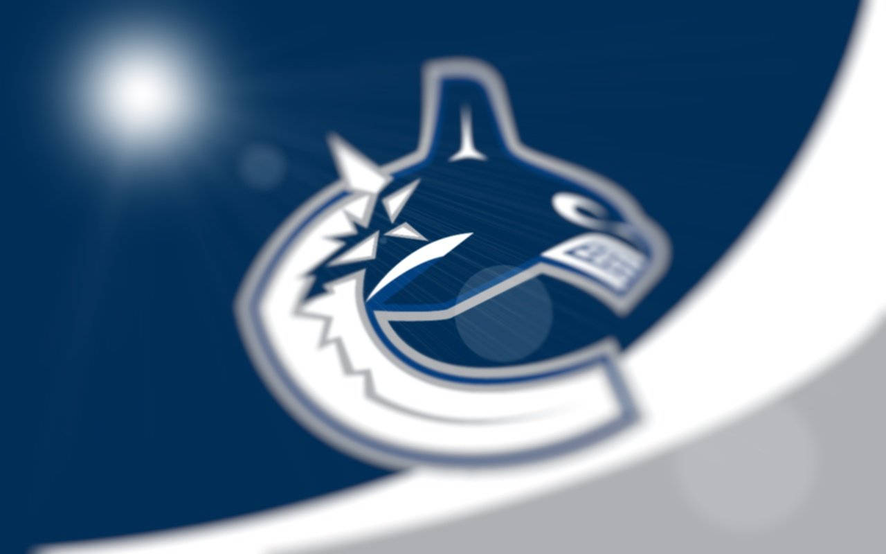 Illuminated Vancouver Canucks Logo Wallpaper