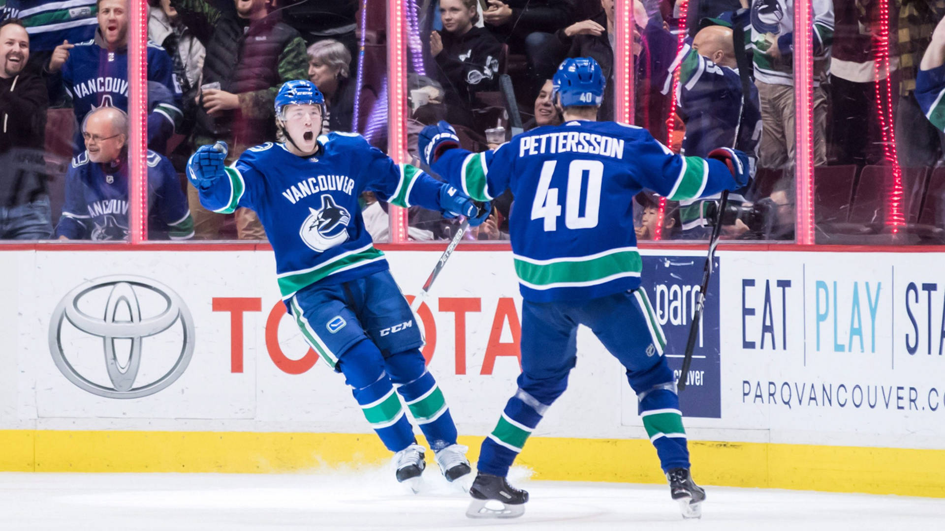Vancouver Canucks Players Elias Pettersson And Brock Boeser Wallpaper