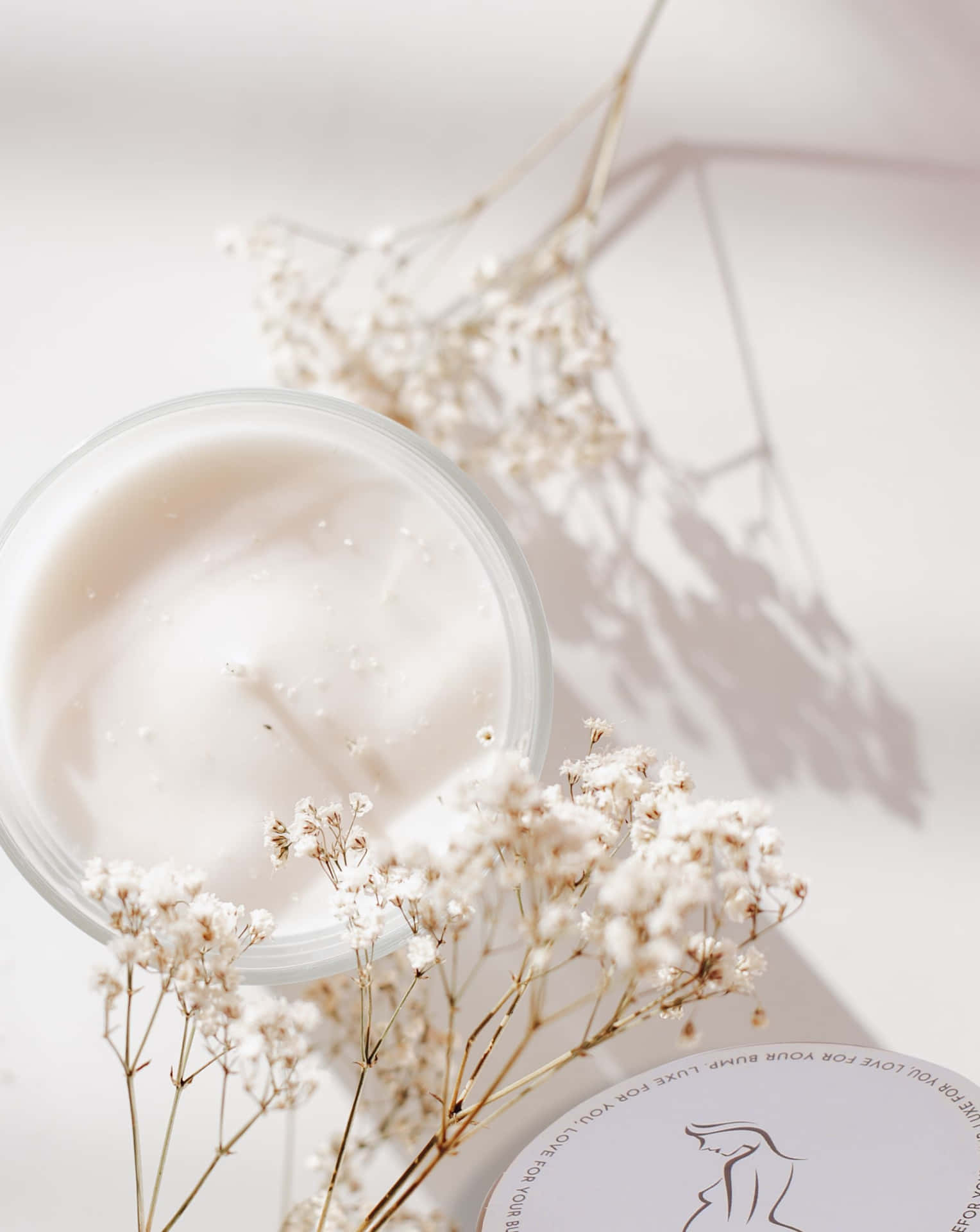 Vanilla Aesthetic Cosmetic Creamand Dried Flowers Wallpaper