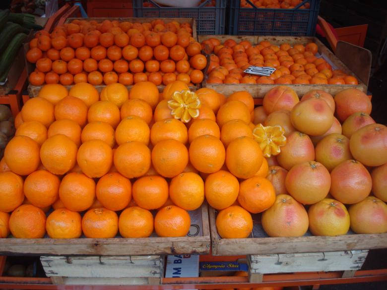 Various Orange Fruits At Market Wallpaper