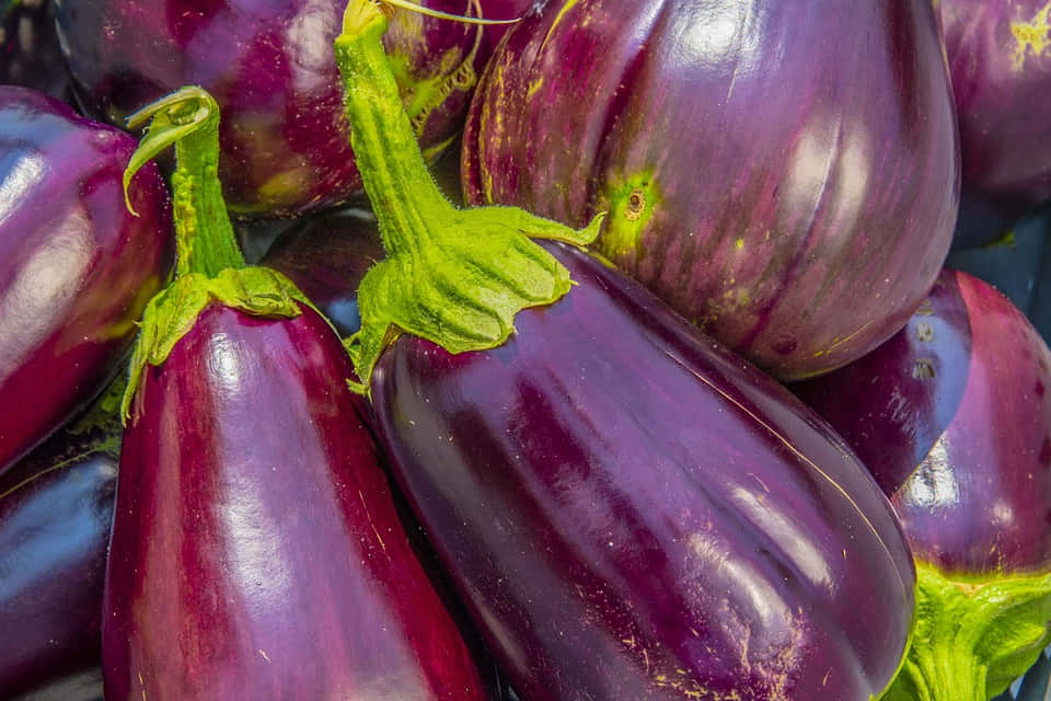 Eggplants Are Piled Up In A Black Box