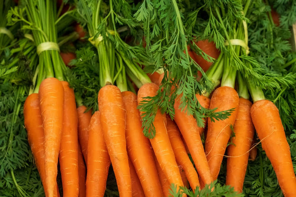 Carrots Are Arranged In A Wooden Box