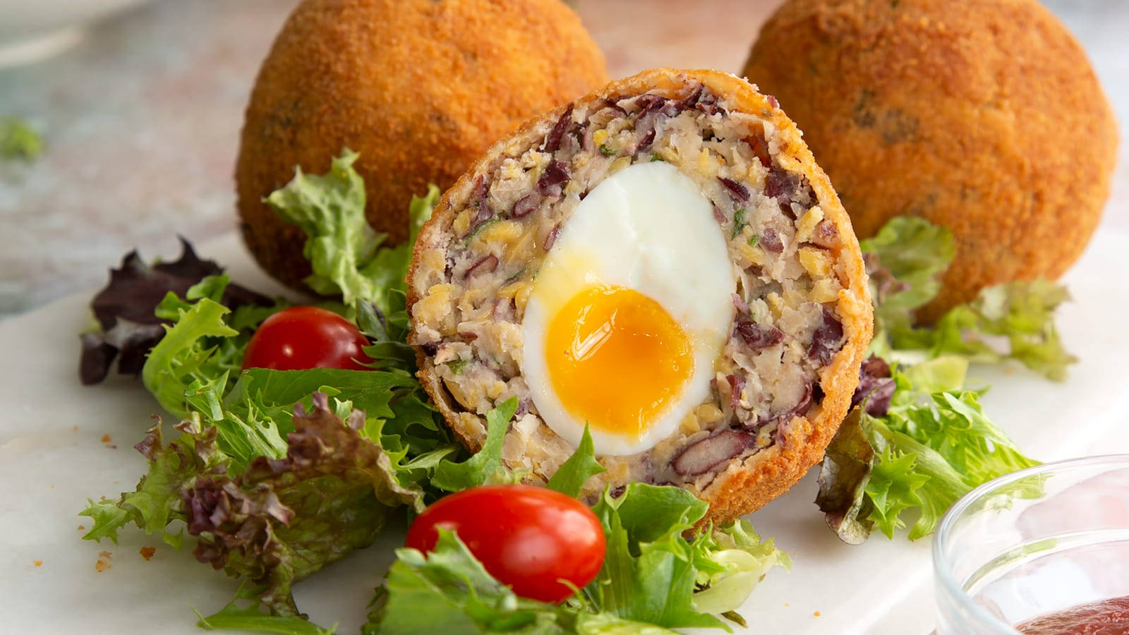 Vegetarian Traditional British Scotch Eggs Dish With Lettuce Wallpaper