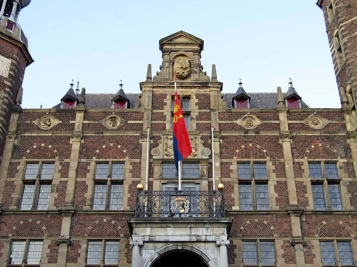 Venlo Historical Buildingwith Flag Wallpaper