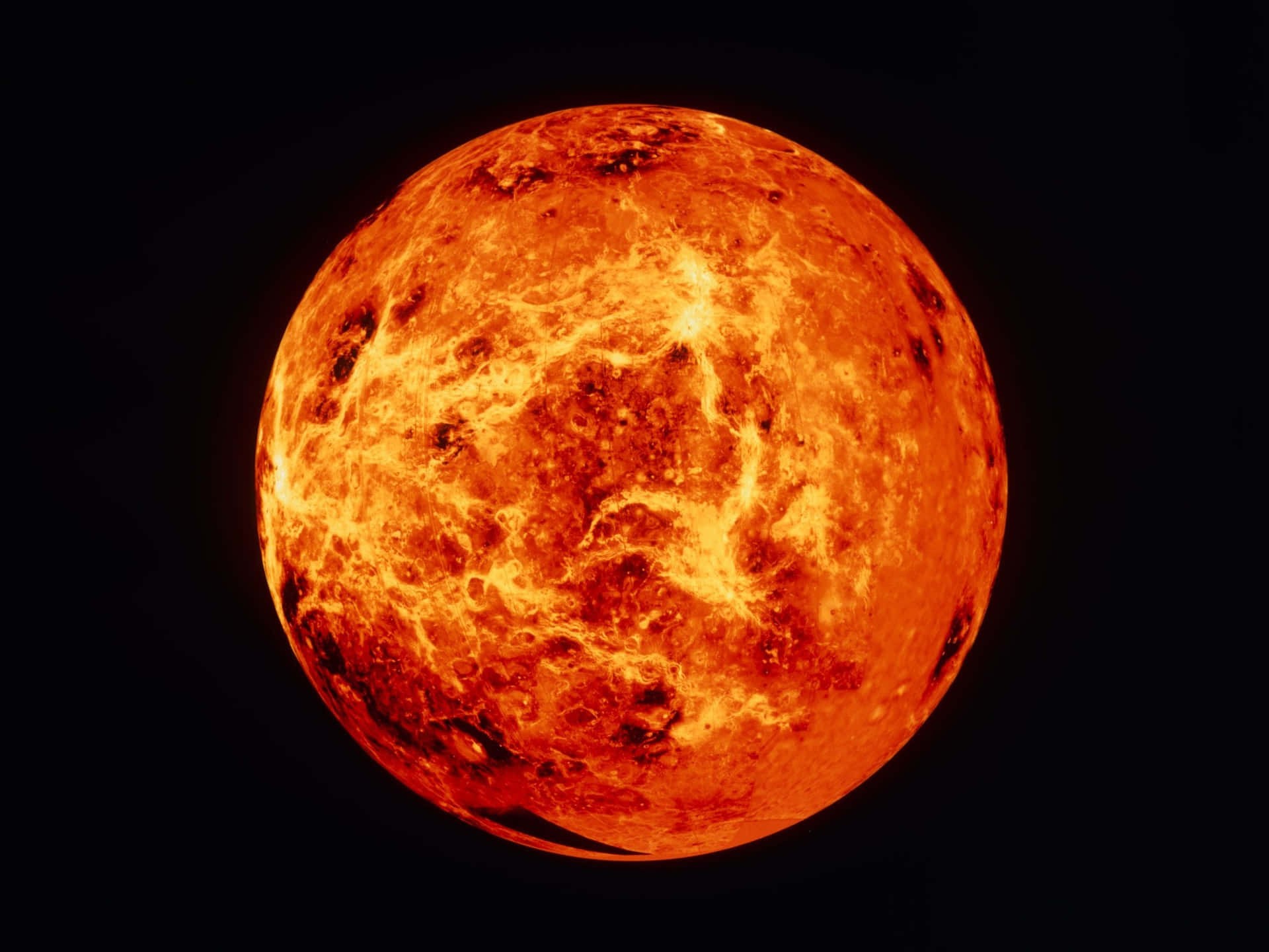 A Large Orange Sphere With A Black Background