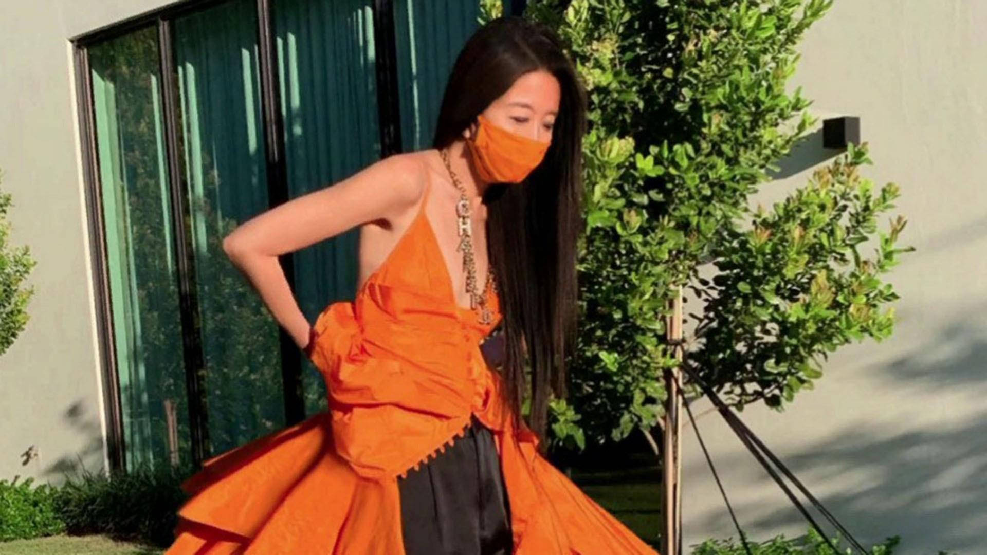 Vera Wang In Orange Dress Wallpaper