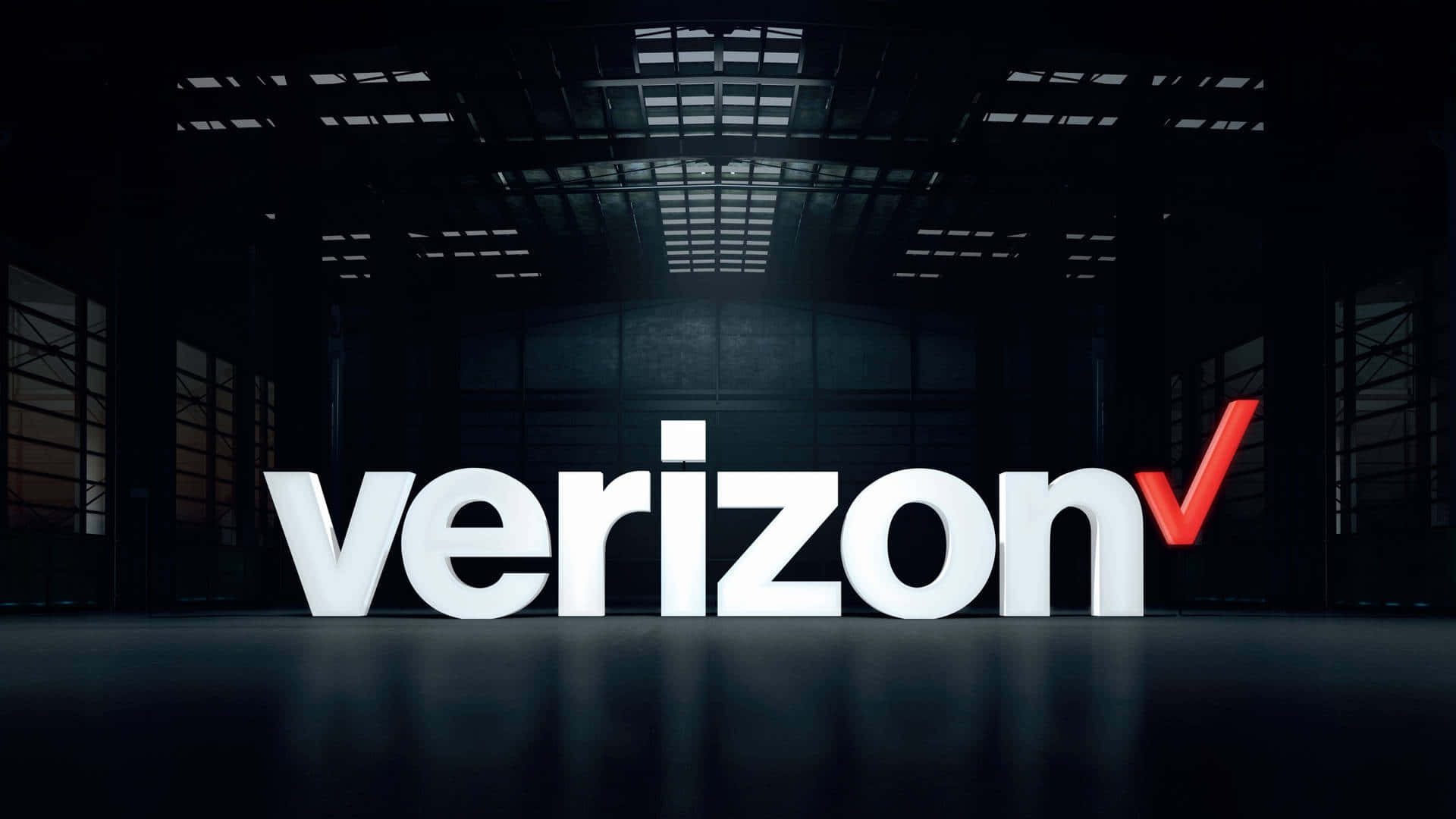 Verizon V Logo In A Dark Warehouse