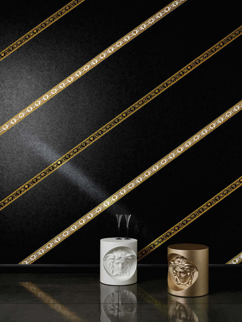 A Gold Vase And A Black Vase On A Black Wall