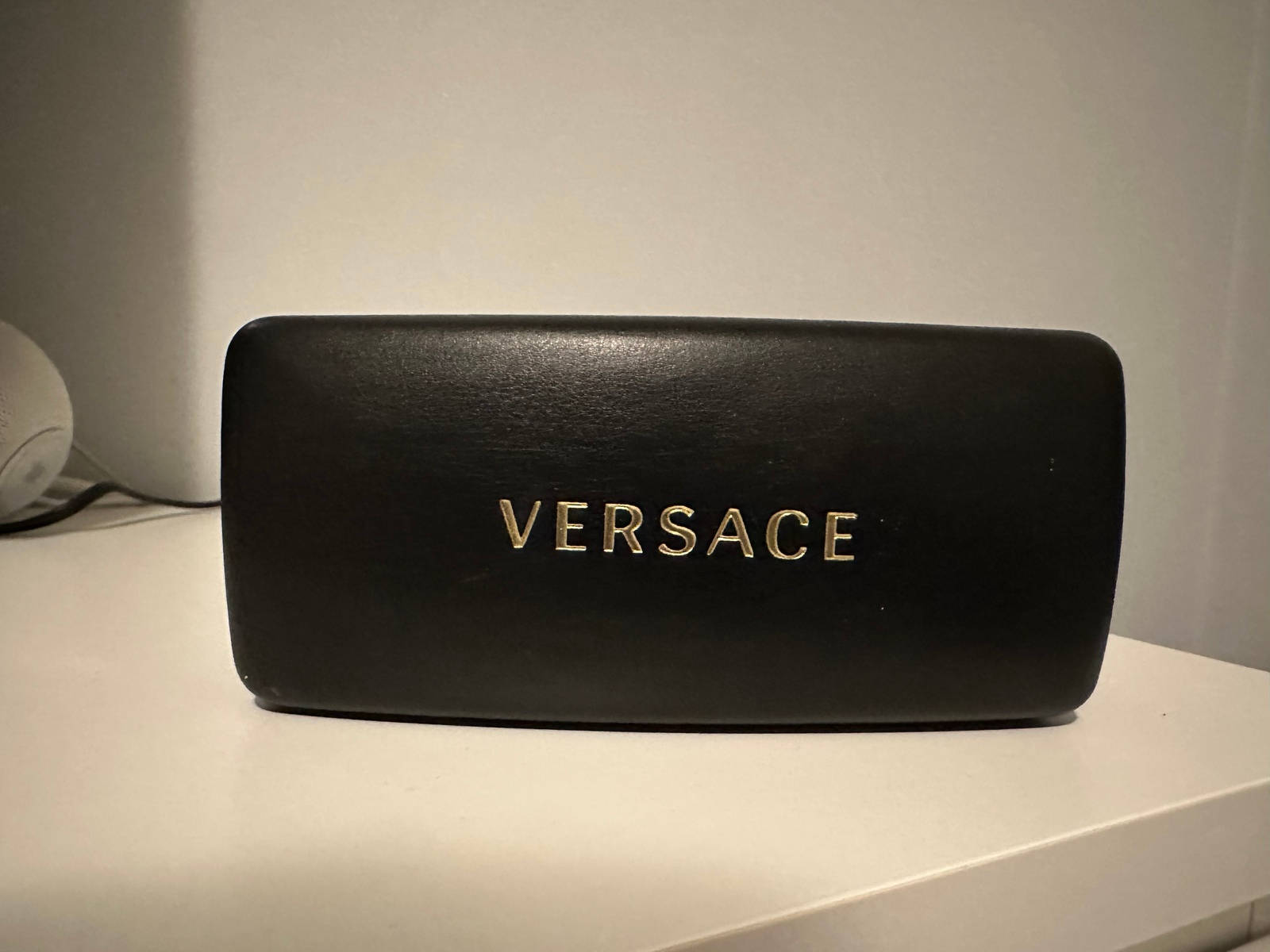 "Spice Up Your Look With Versace Sunglasses Case" Wallpaper