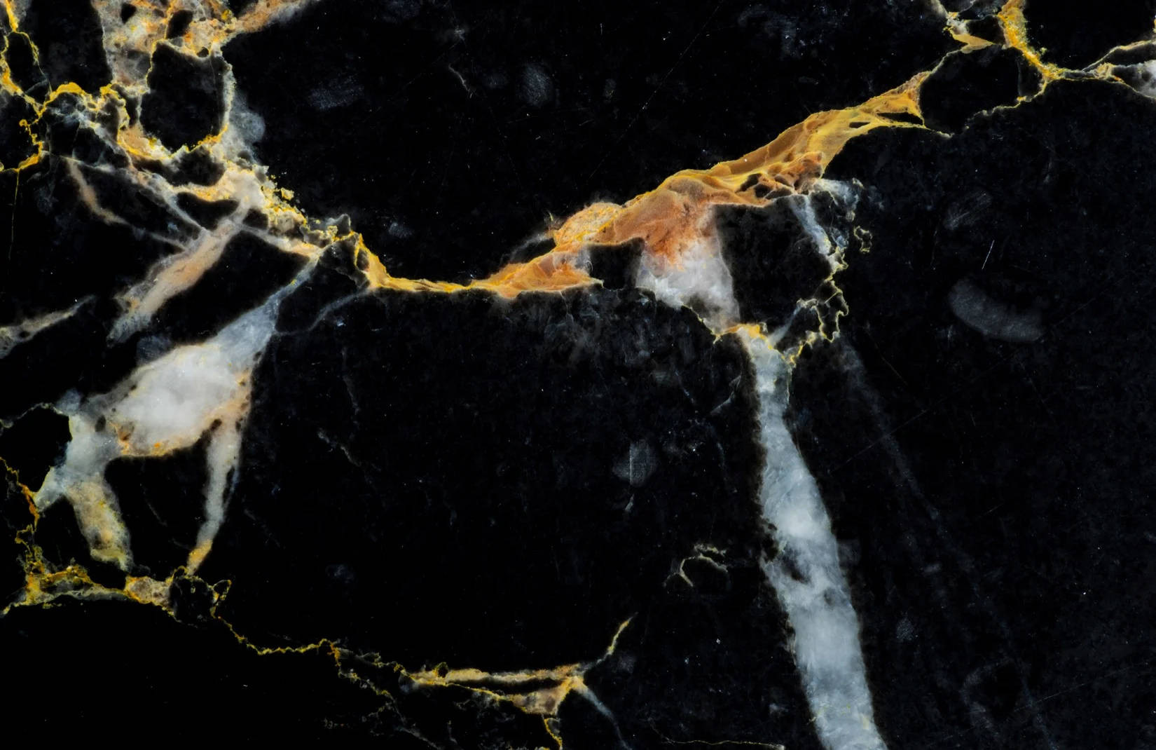 Vibrant Black And Gold Marble Wallpaper
