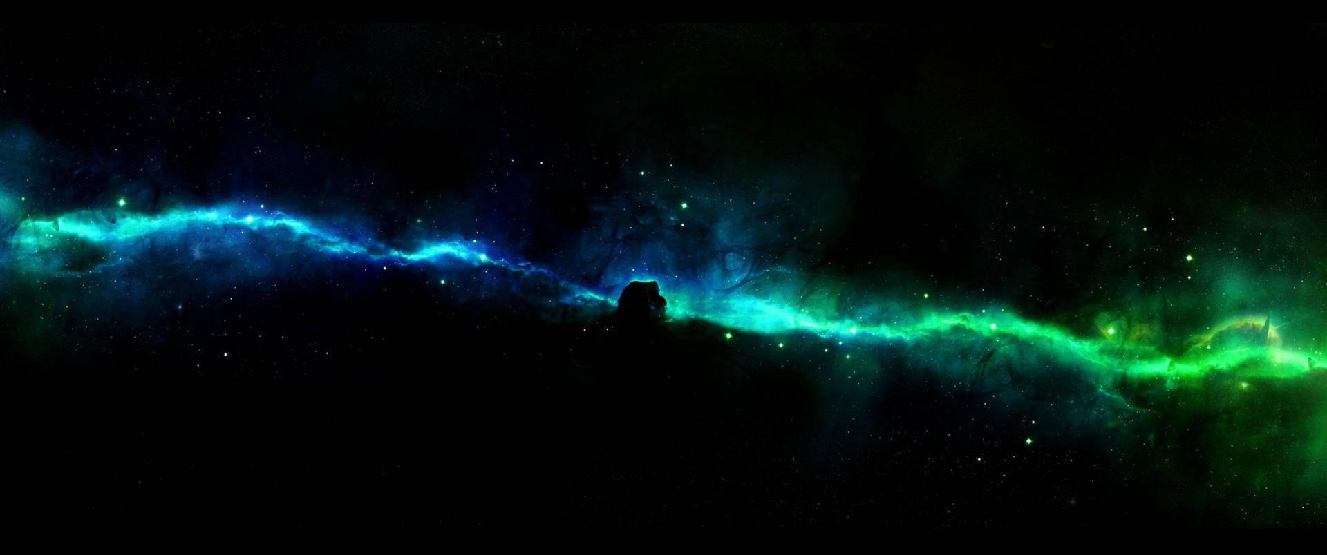Blue and green light spreading across a galaxy wallpaper.