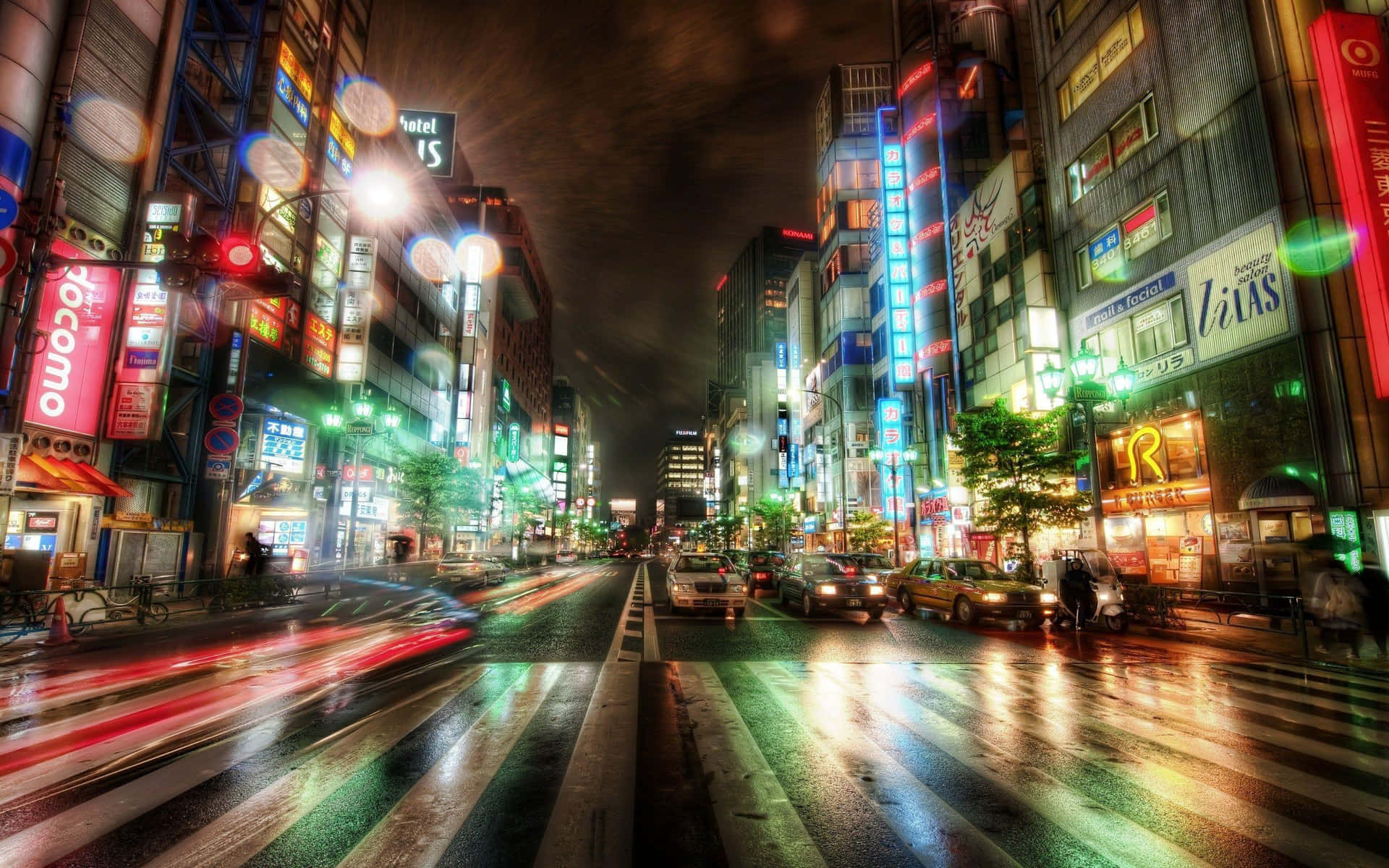 Vibrant_ City_ Night_ Lights_ Street_ Scene.jpg Wallpaper