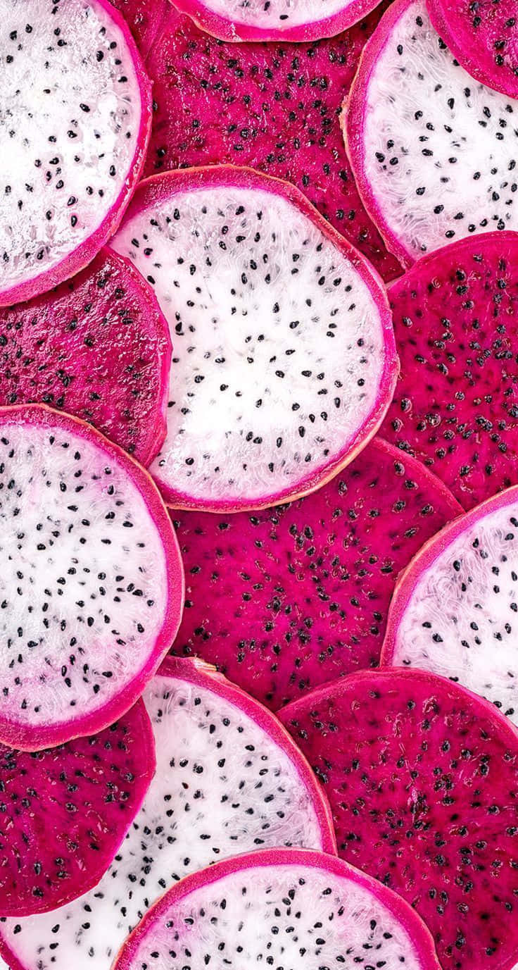 Vibrant_ Dragon_ Fruit_ Slices_ Background Wallpaper