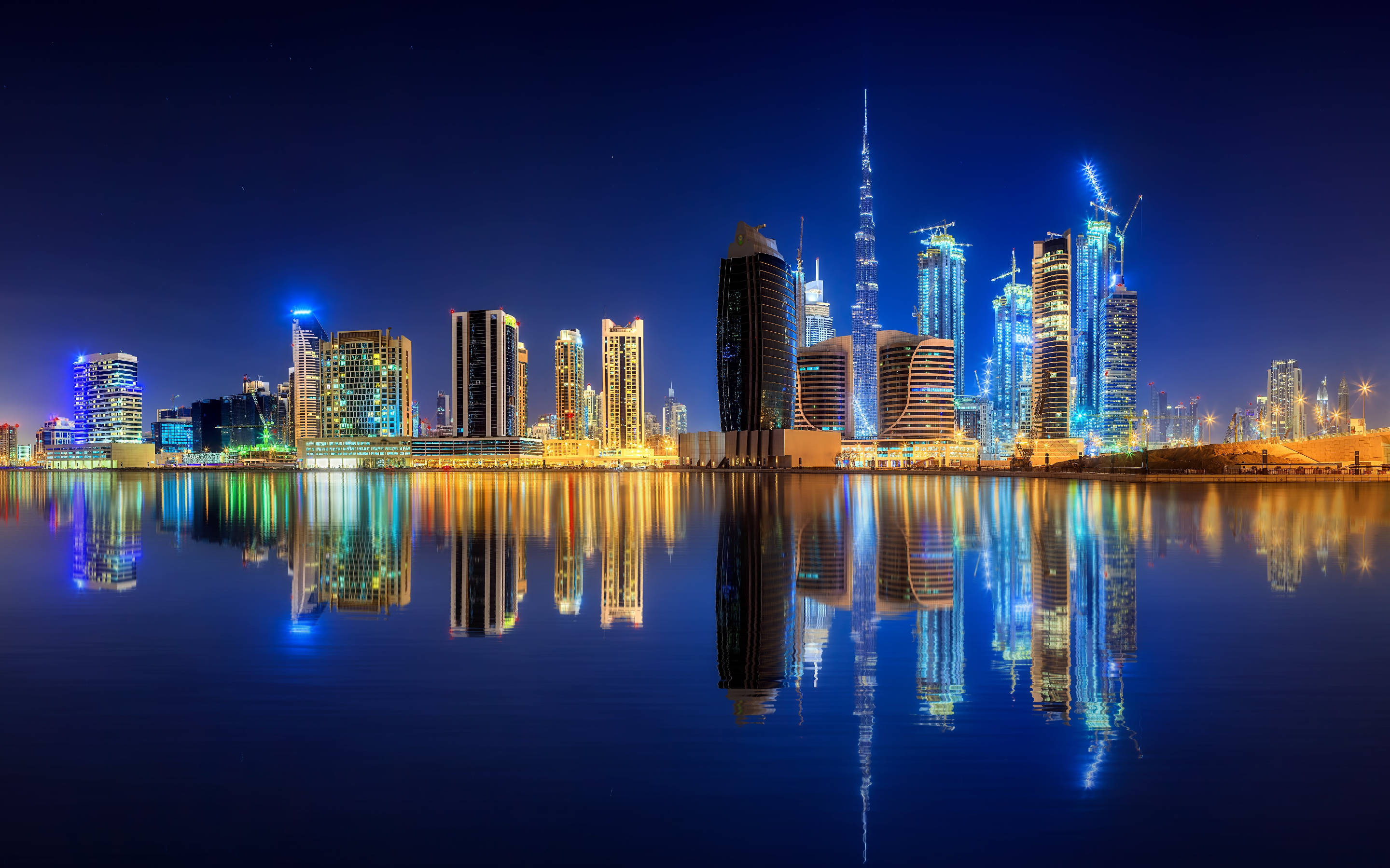 Vibrant Dubai And Burj Khalifa Wallpaper