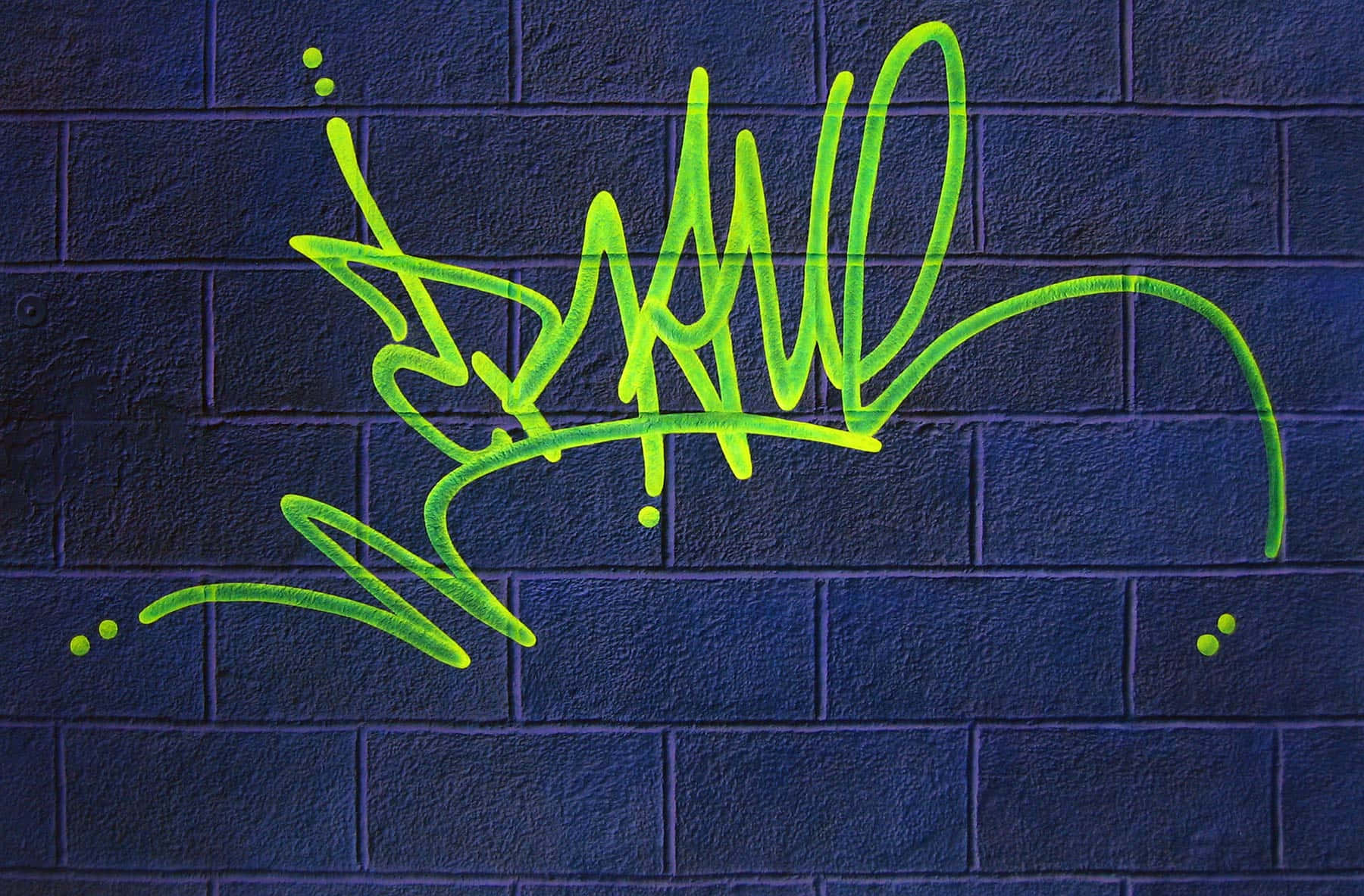 Download Vibrant Neon Graffiti At Night Wallpaper | Wallpapers.com