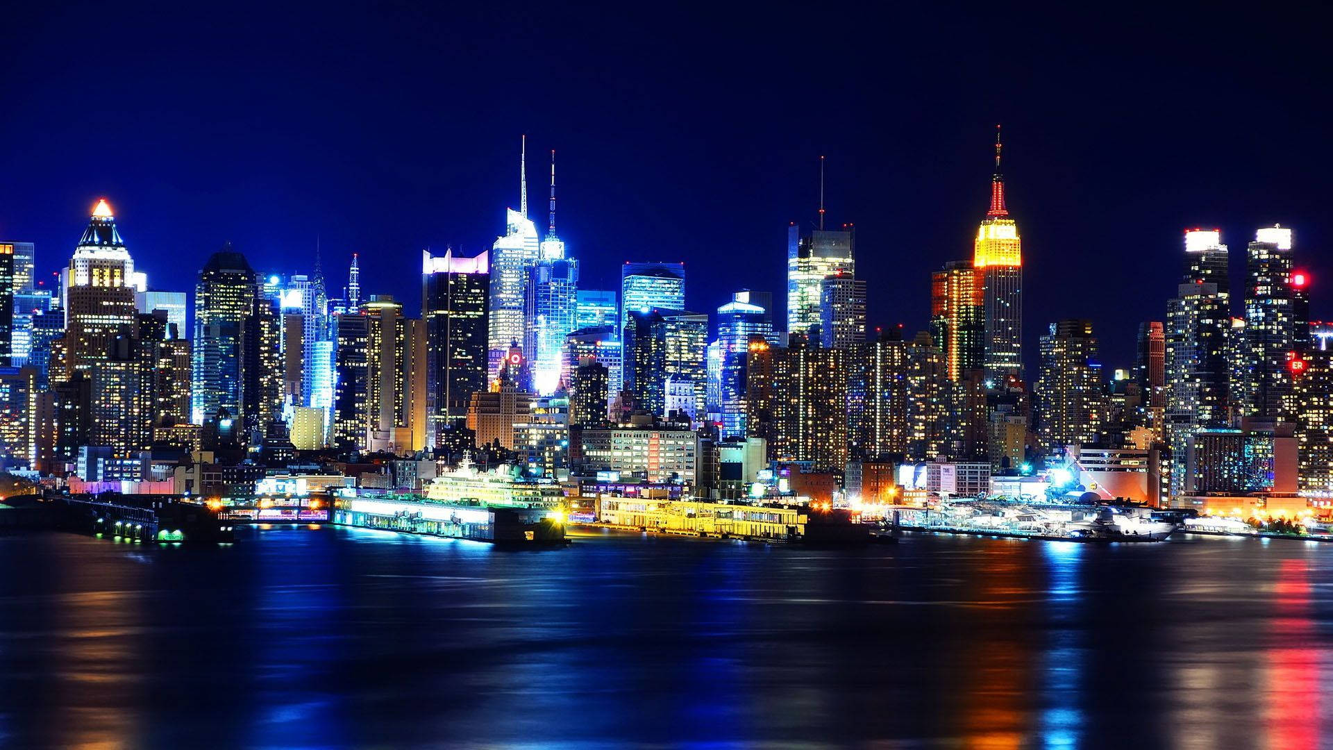 Vibrant New York Skyline At Night Wallpaper