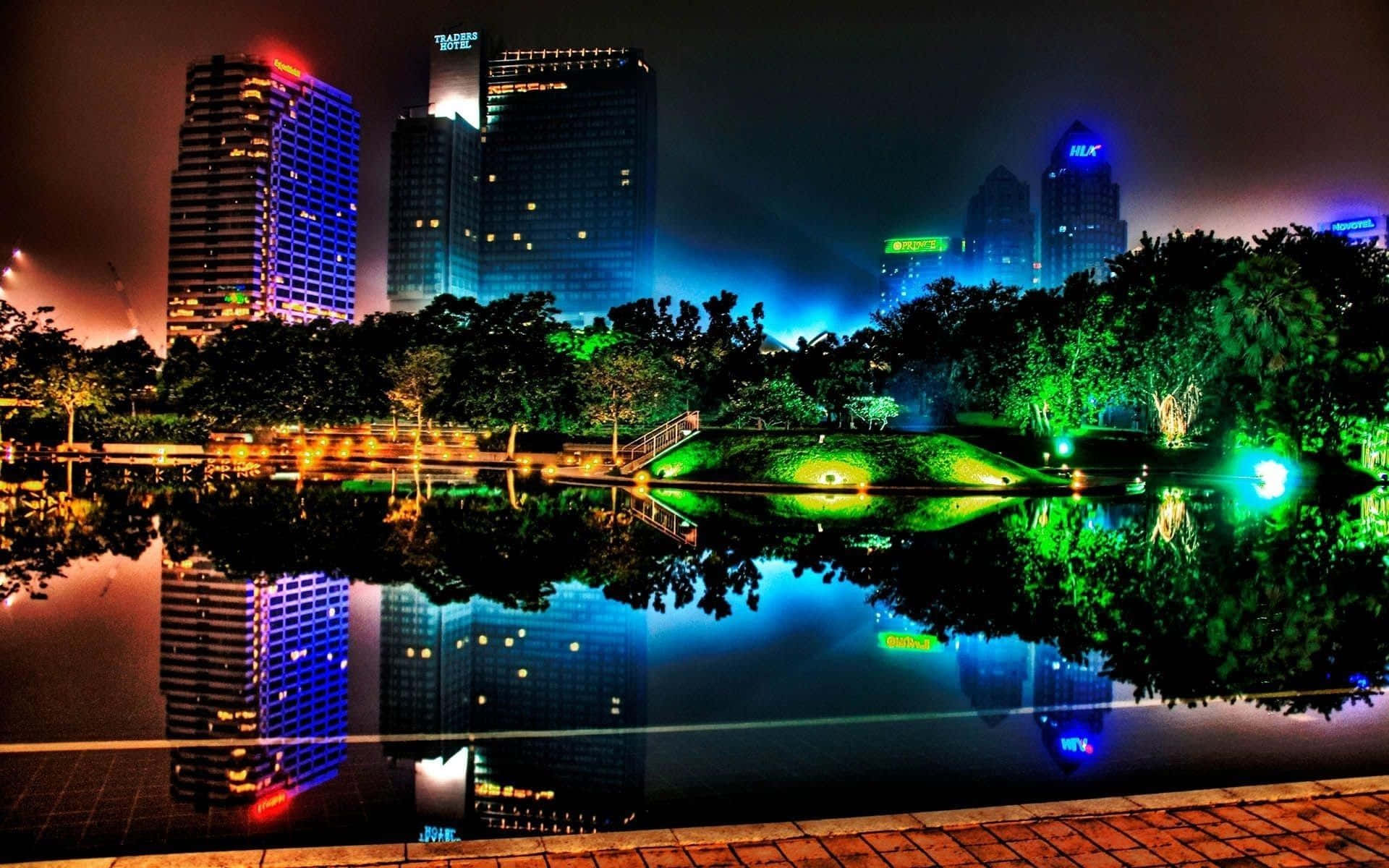 Vibrant_ Night_ Cityscape_ Reflections.jpg Wallpaper