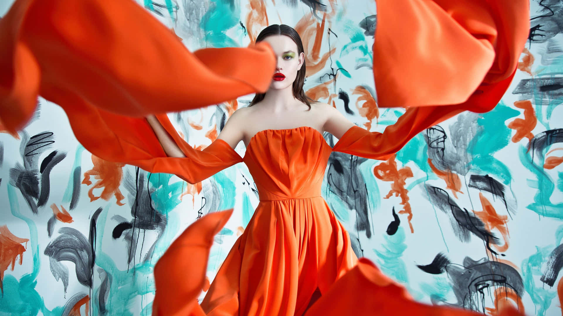 Vibrant Orange Dress Artistic Backdrop Wallpaper