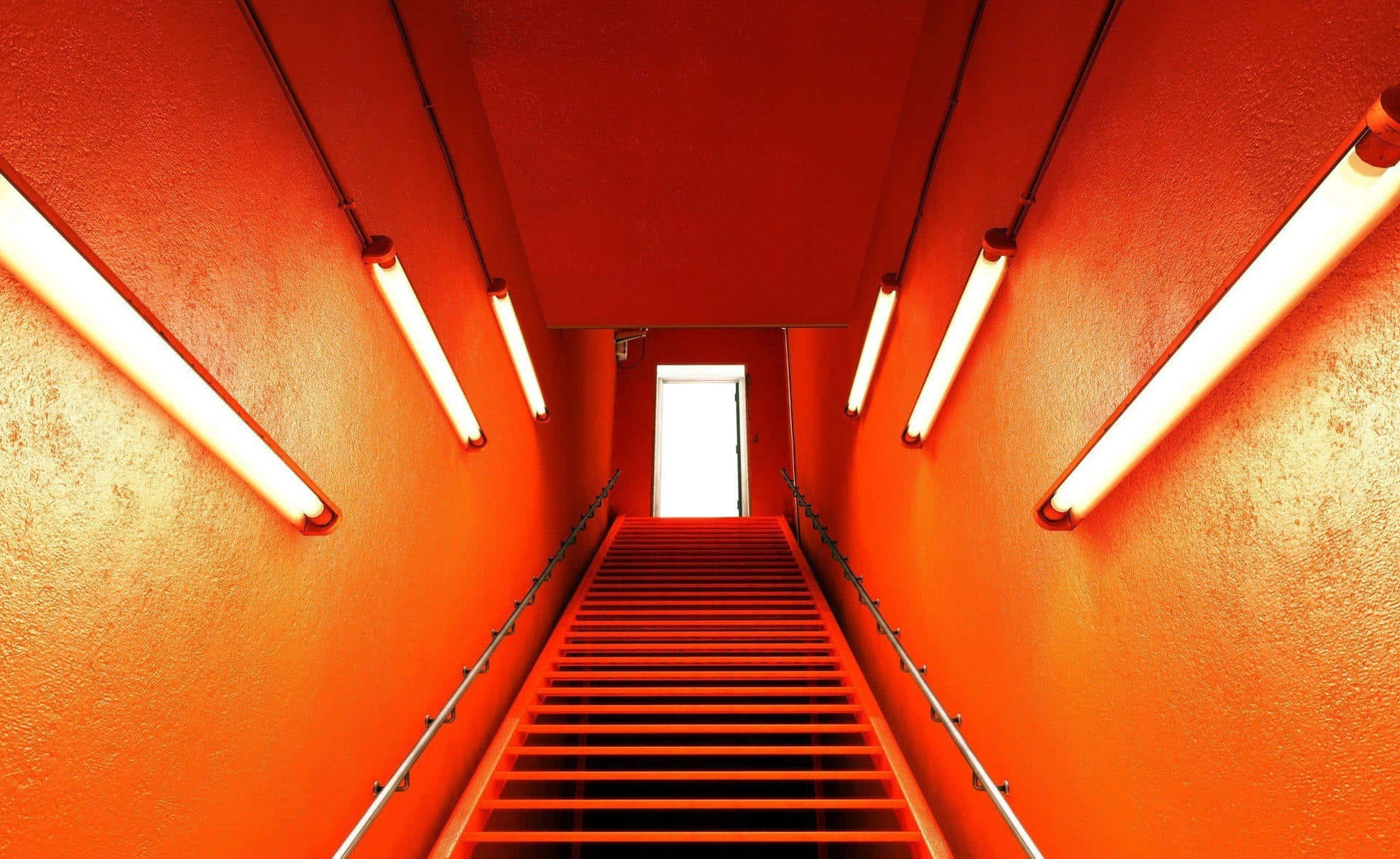 Vibrant Orange Staircasewith Lights Wallpaper