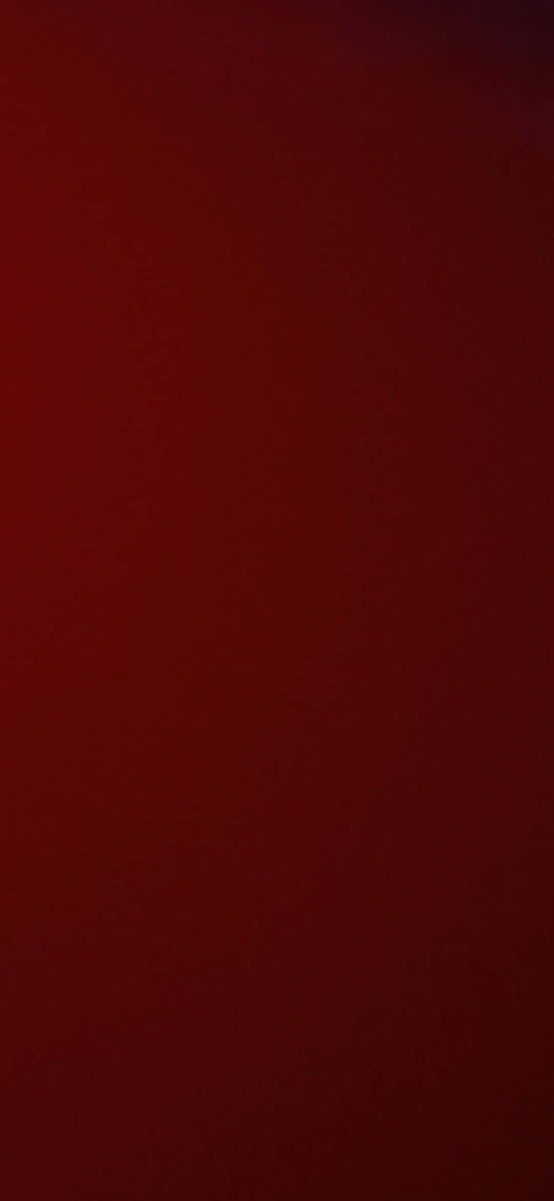 Vibrant solid red background — A solid deep red textured background with subtle gradient and grainy surface.