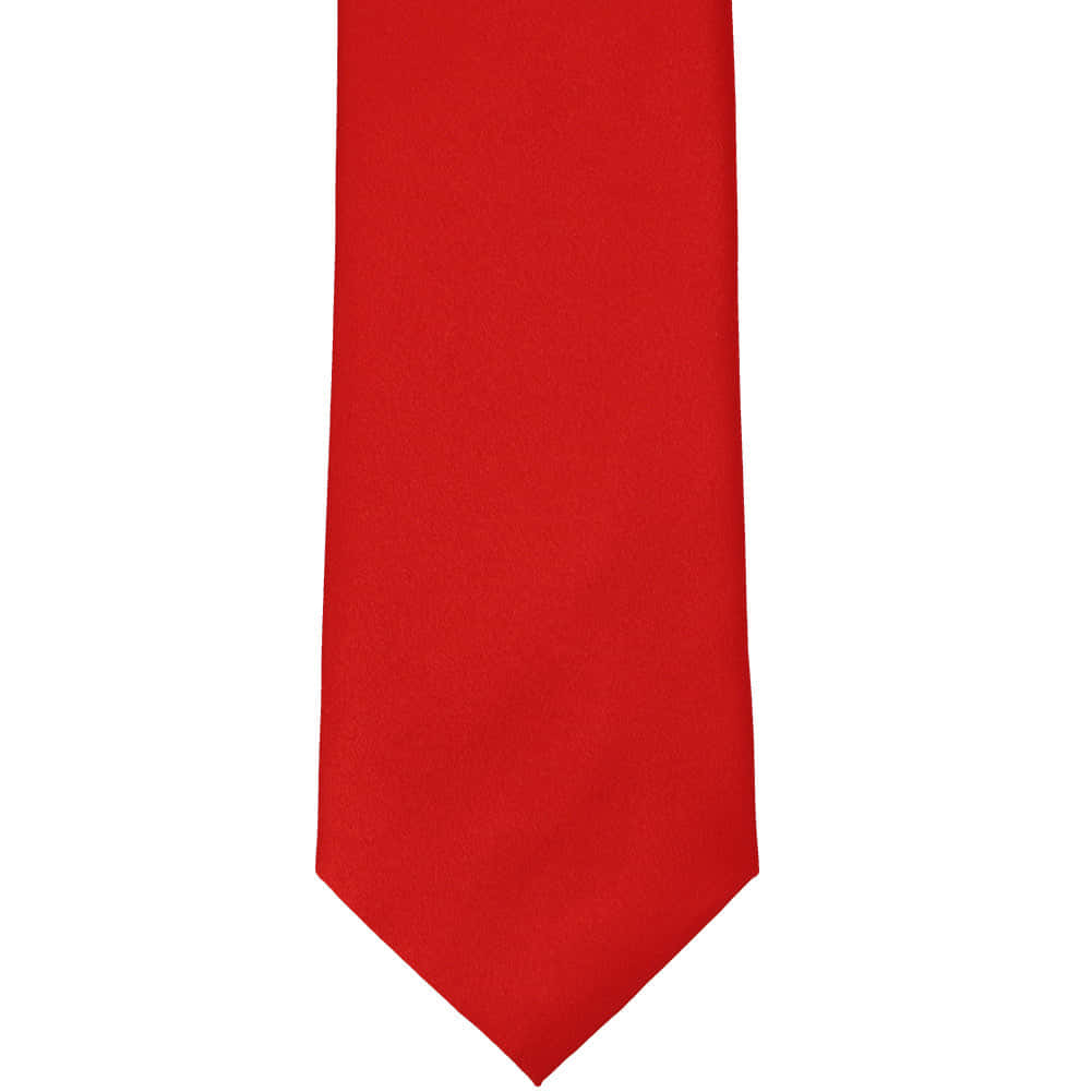 Vibrant Solid Red Background — A solid red necktie with a smooth texture hangs vertically against a stark white background.