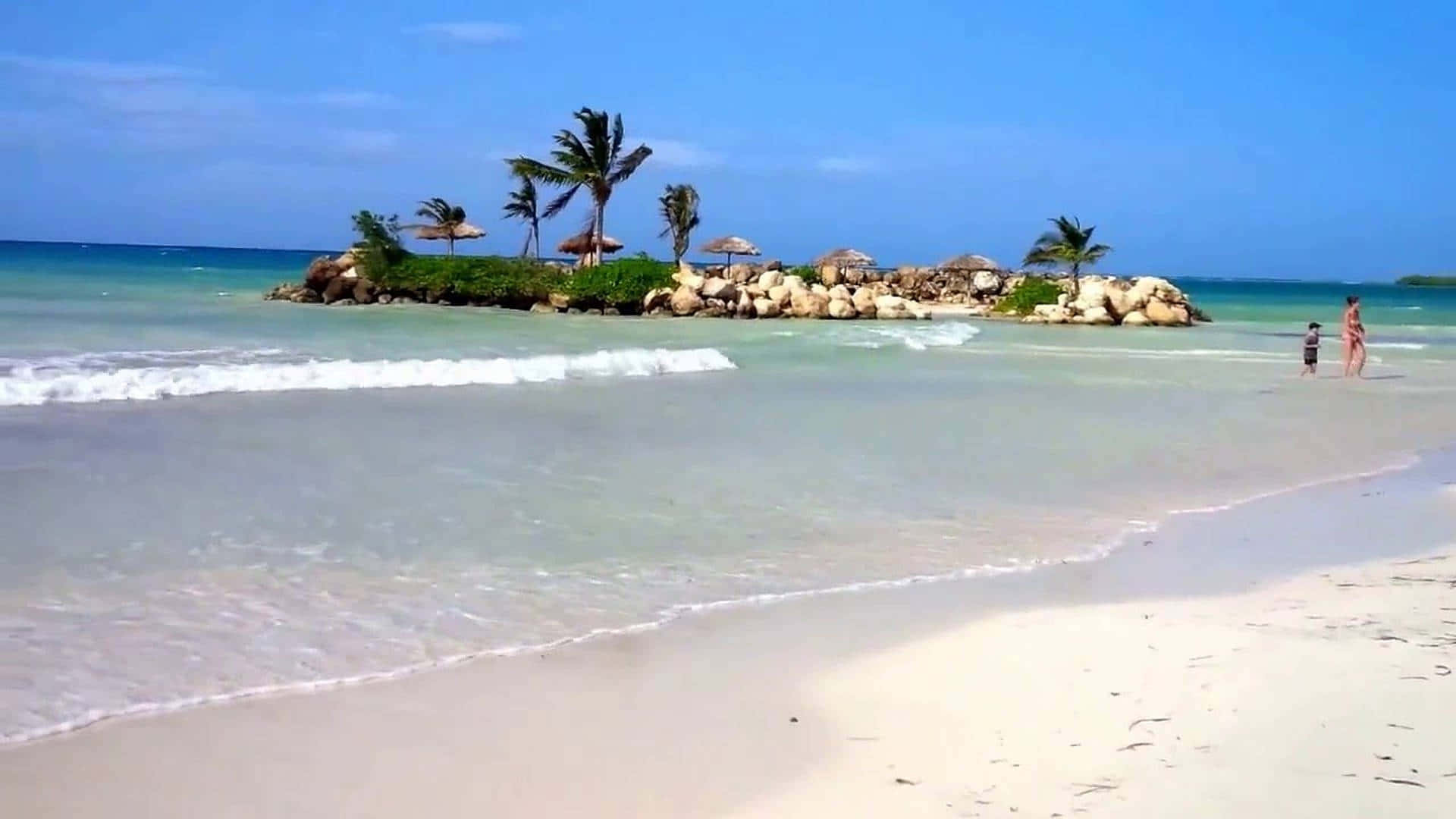 Vibranteatardecer Jamaicano Sobre Una Playa Impresionante.