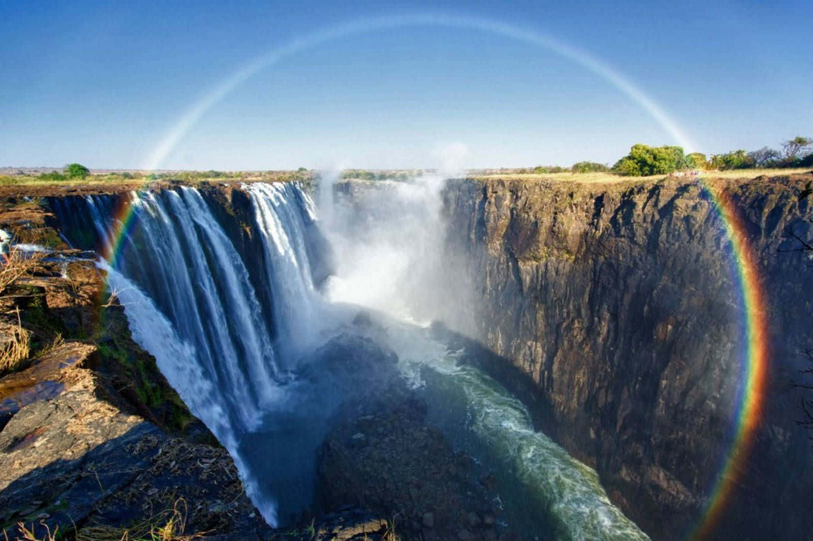 Victoria Falls With A Rainbow Halo Wallpaper
