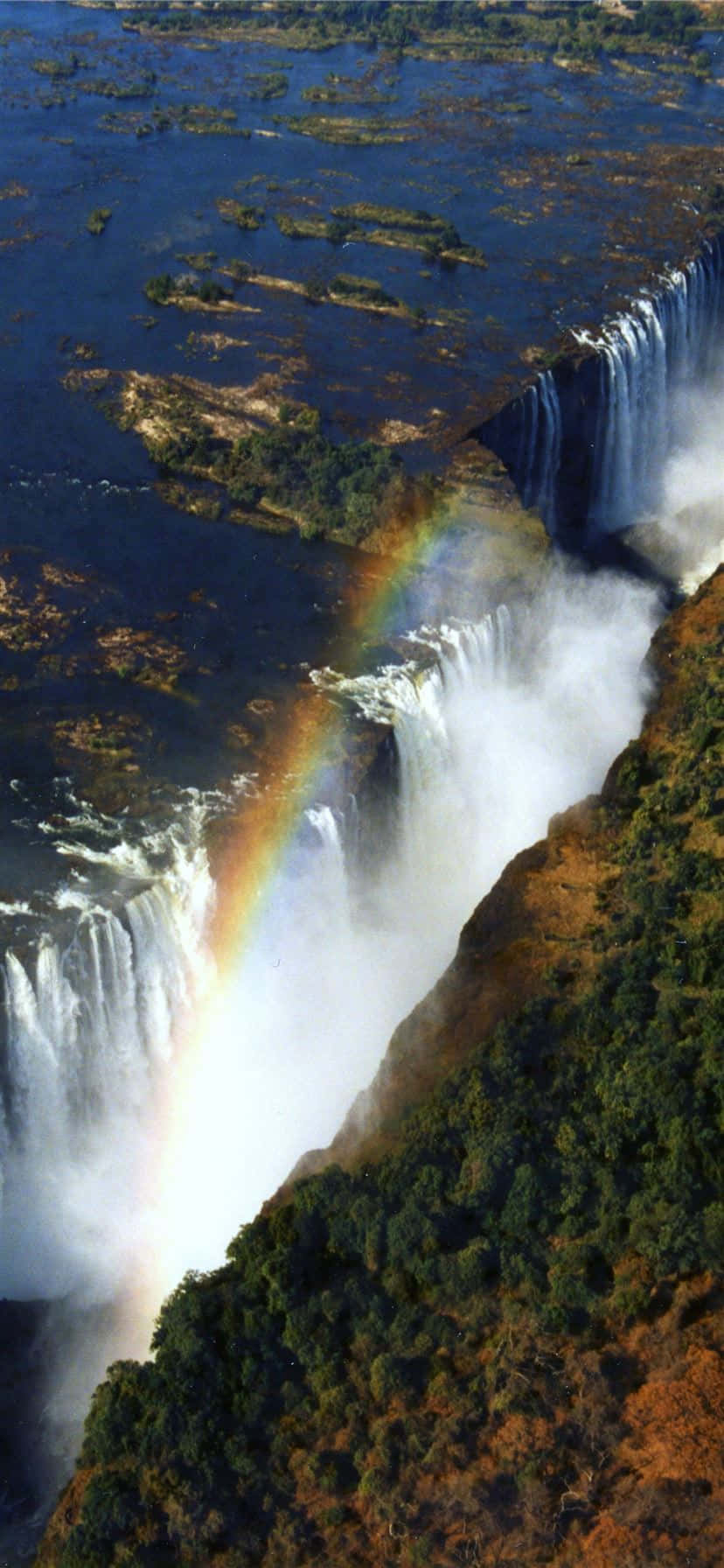 Victoria Falls With A Rainbow Wallpaper