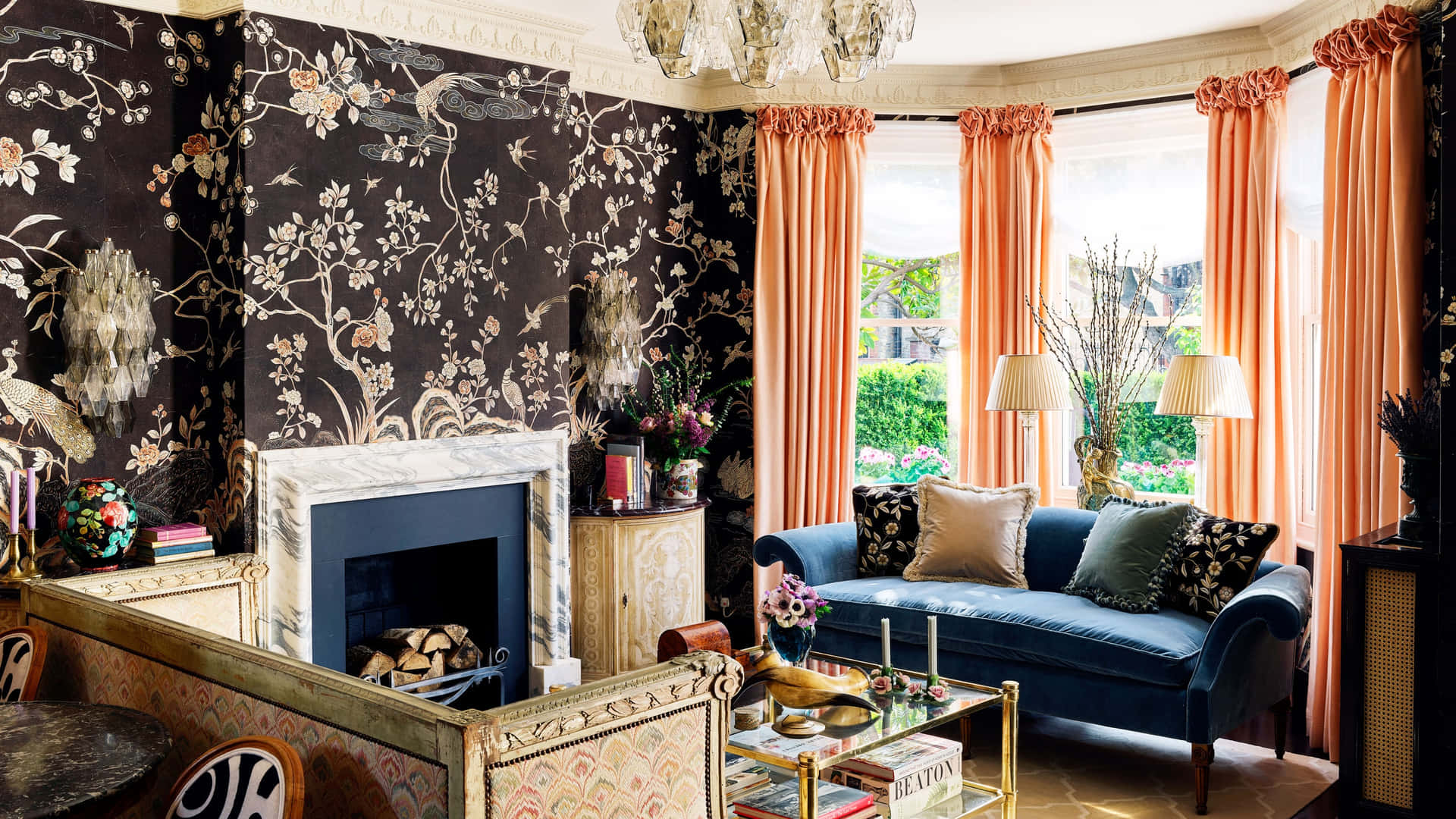 A Living Room With A Fireplace And Floral Wallpaper