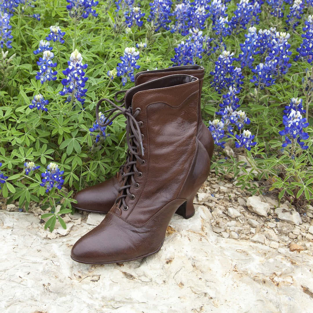 Victorian Inspired Lace Up Boots Among Bluebonnets Wallpaper