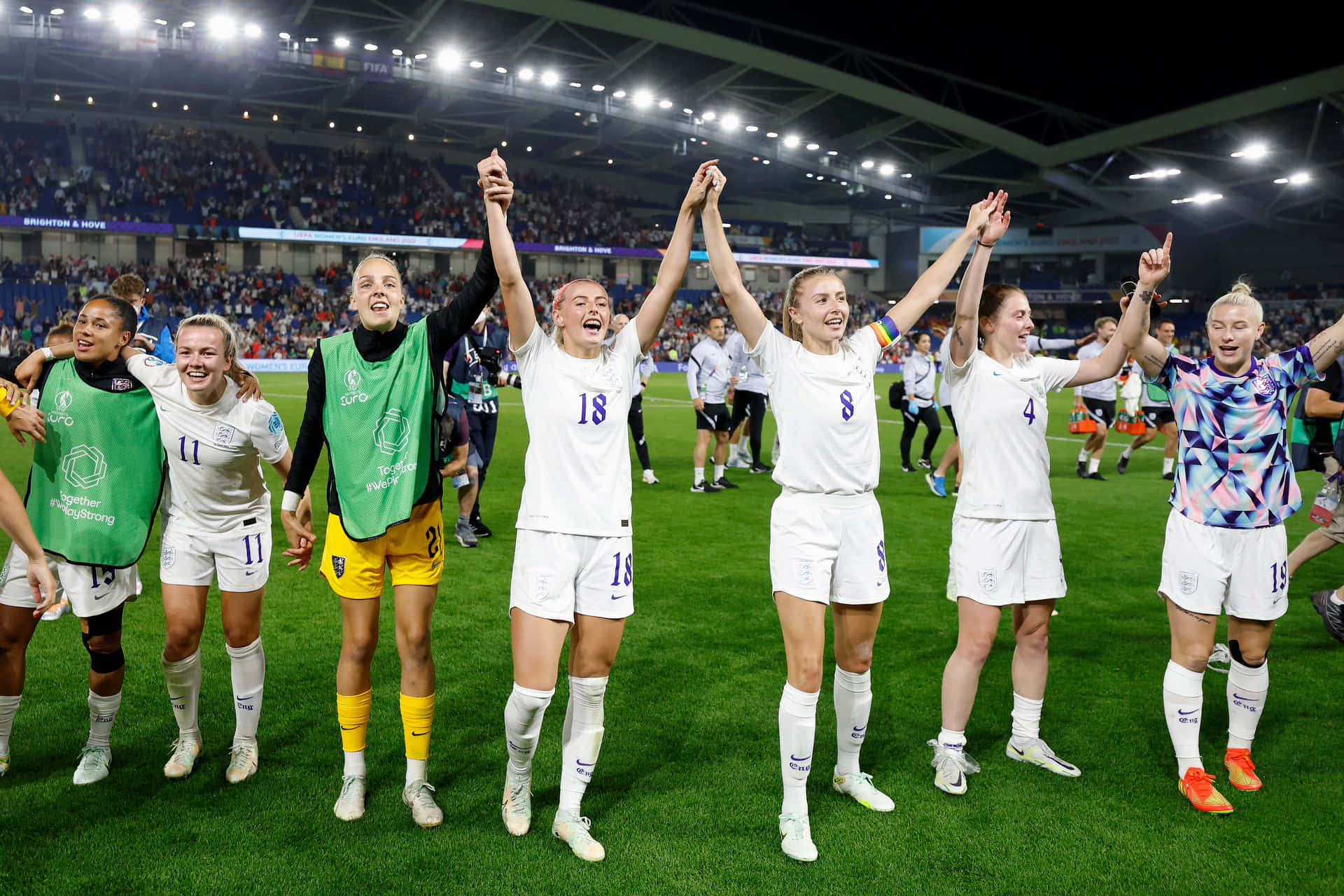Victorious Girls Soccer Team Celebration Wallpaper