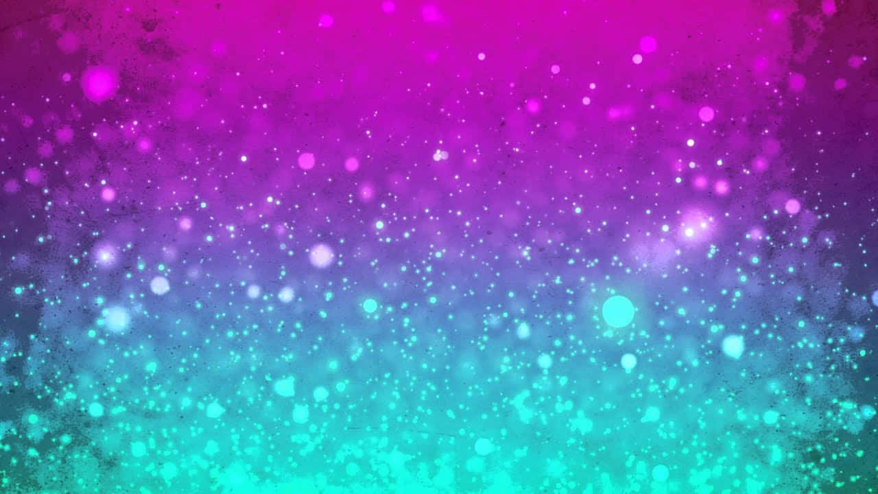 A Colorful Background With Glitter And Sparkles Wallpaper