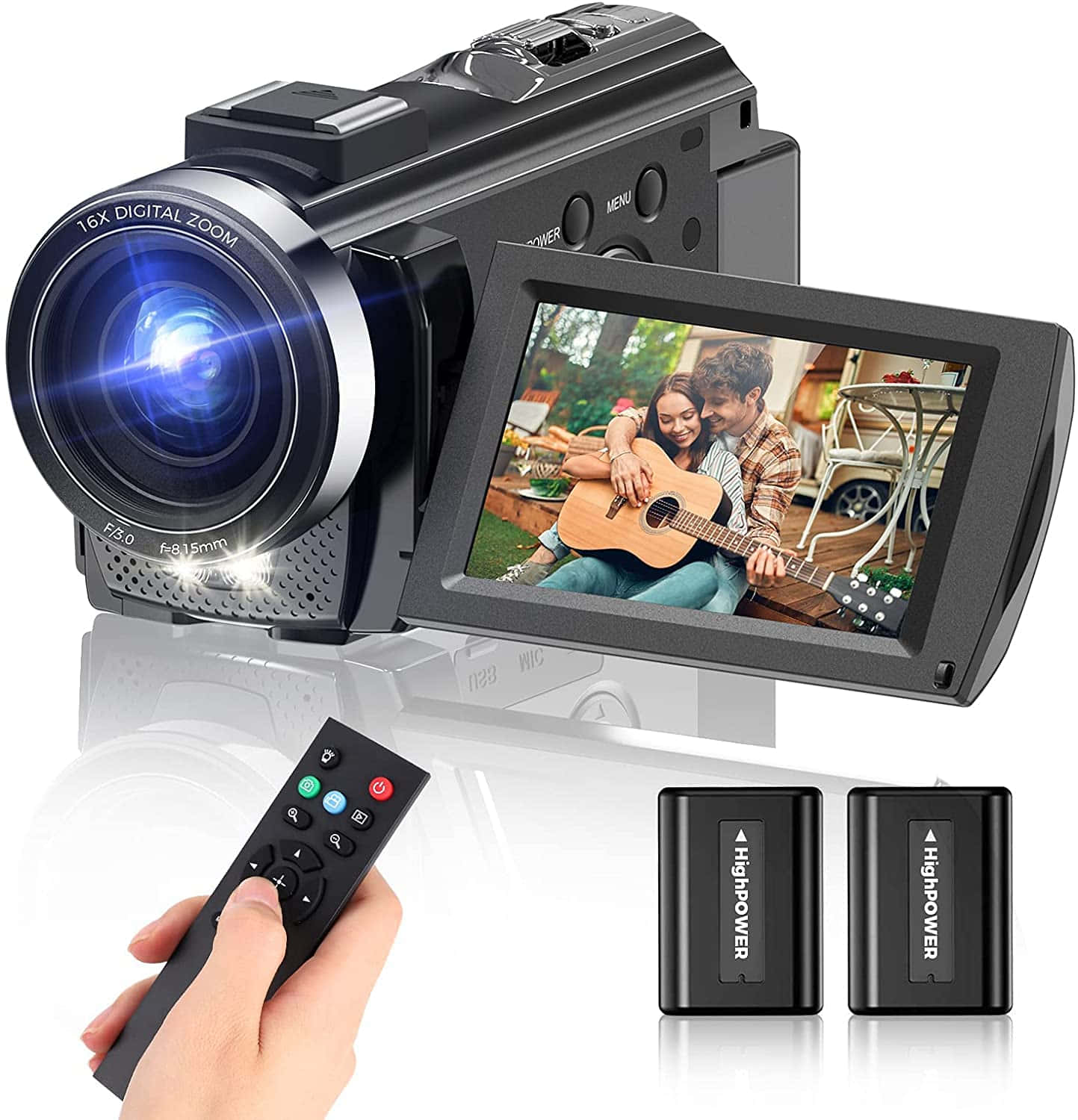 A Hand Holding A Video Camera With Remote Control Wallpaper