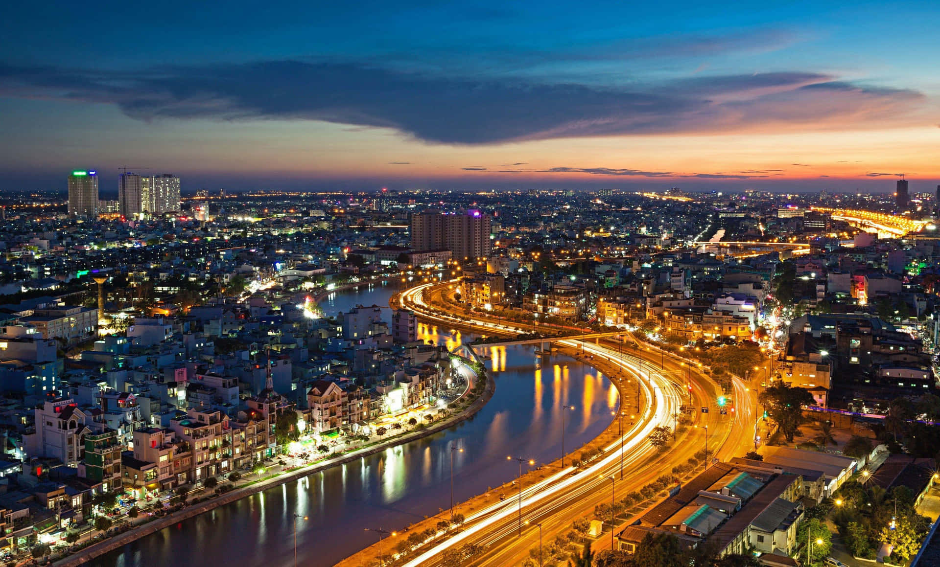 Stunning Vietnamese landscape with vibrant rice fields and towering limestone mountains.