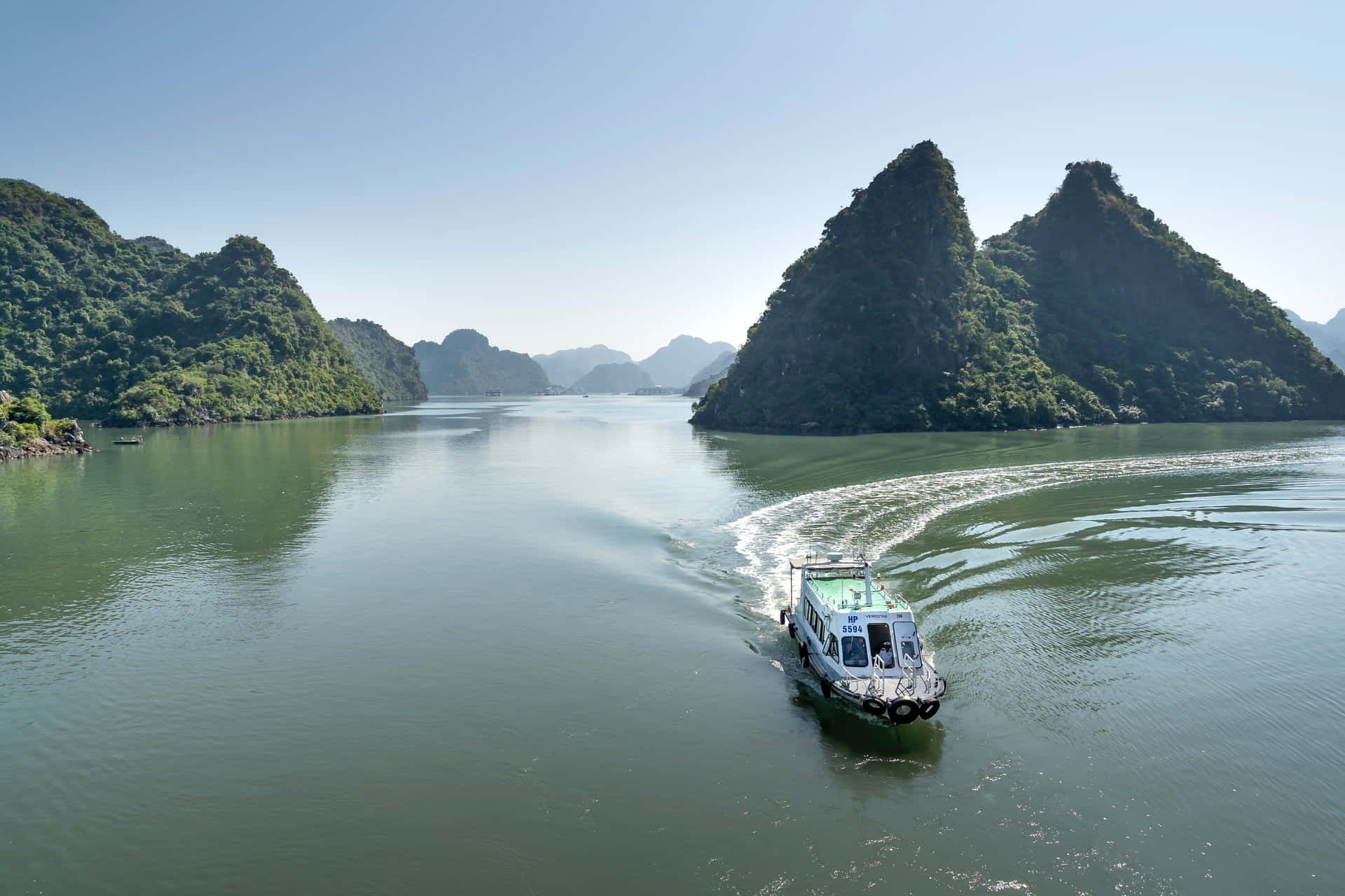 Vietnam's Halong Bay With Speedboat Wallpaper