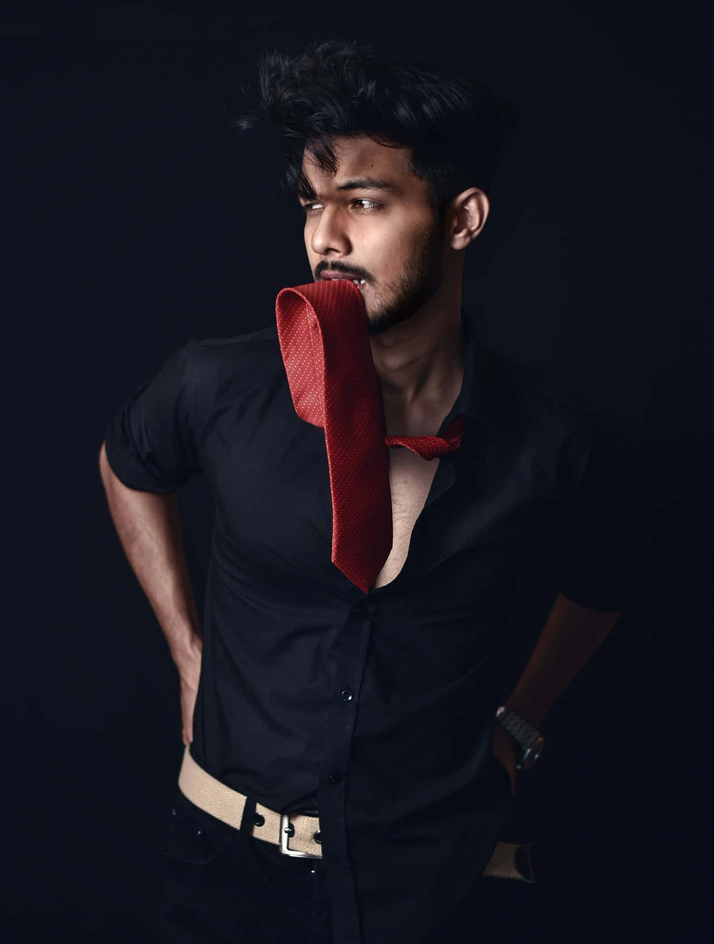 Image of Portrait of Attractive Indian Male Model With an Expression Over  an Black Background-DR290612-Picxy
