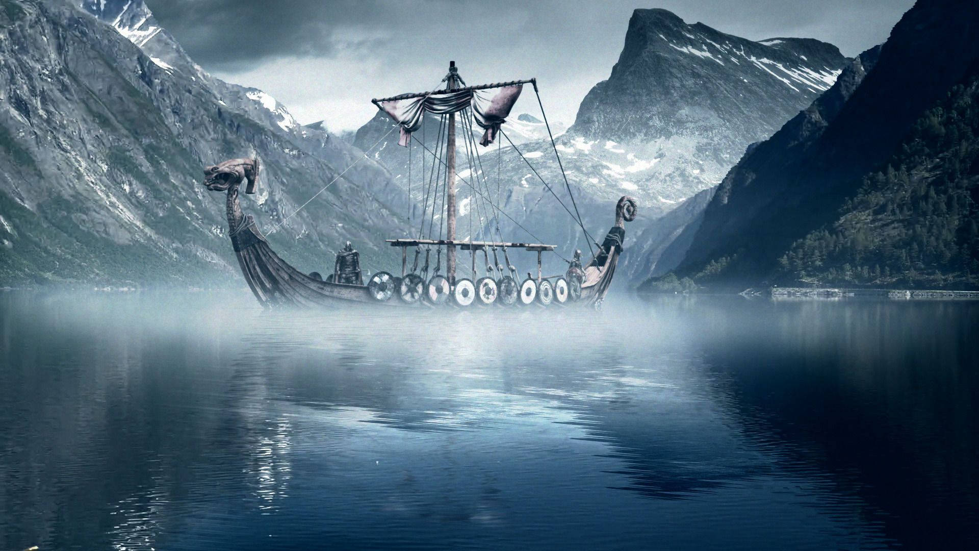 A Viking Longship Sailing Through the Seas Wallpaper