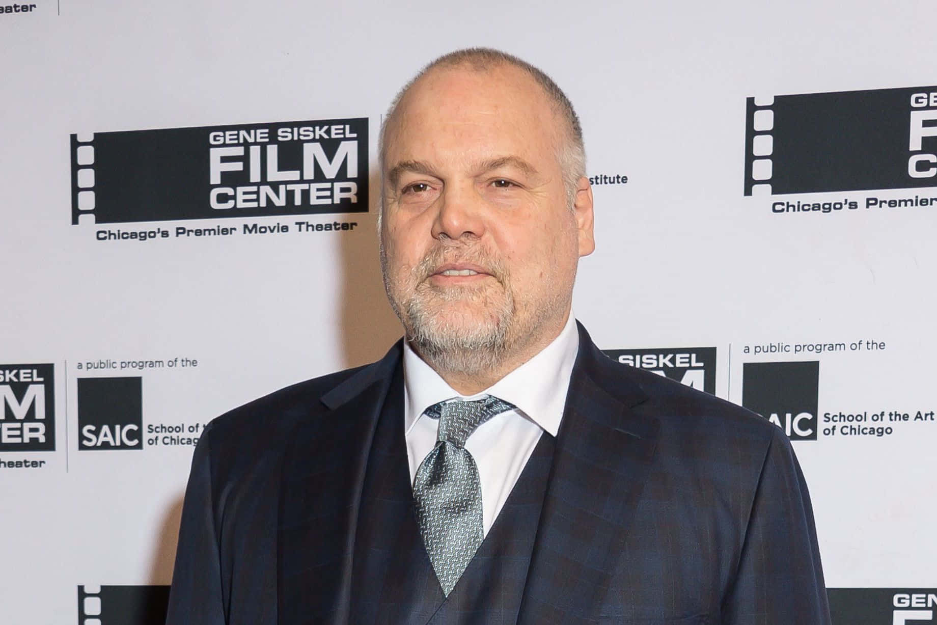 Vincent D'Onofrio exuding charm in a captivating close-up shot Wallpaper